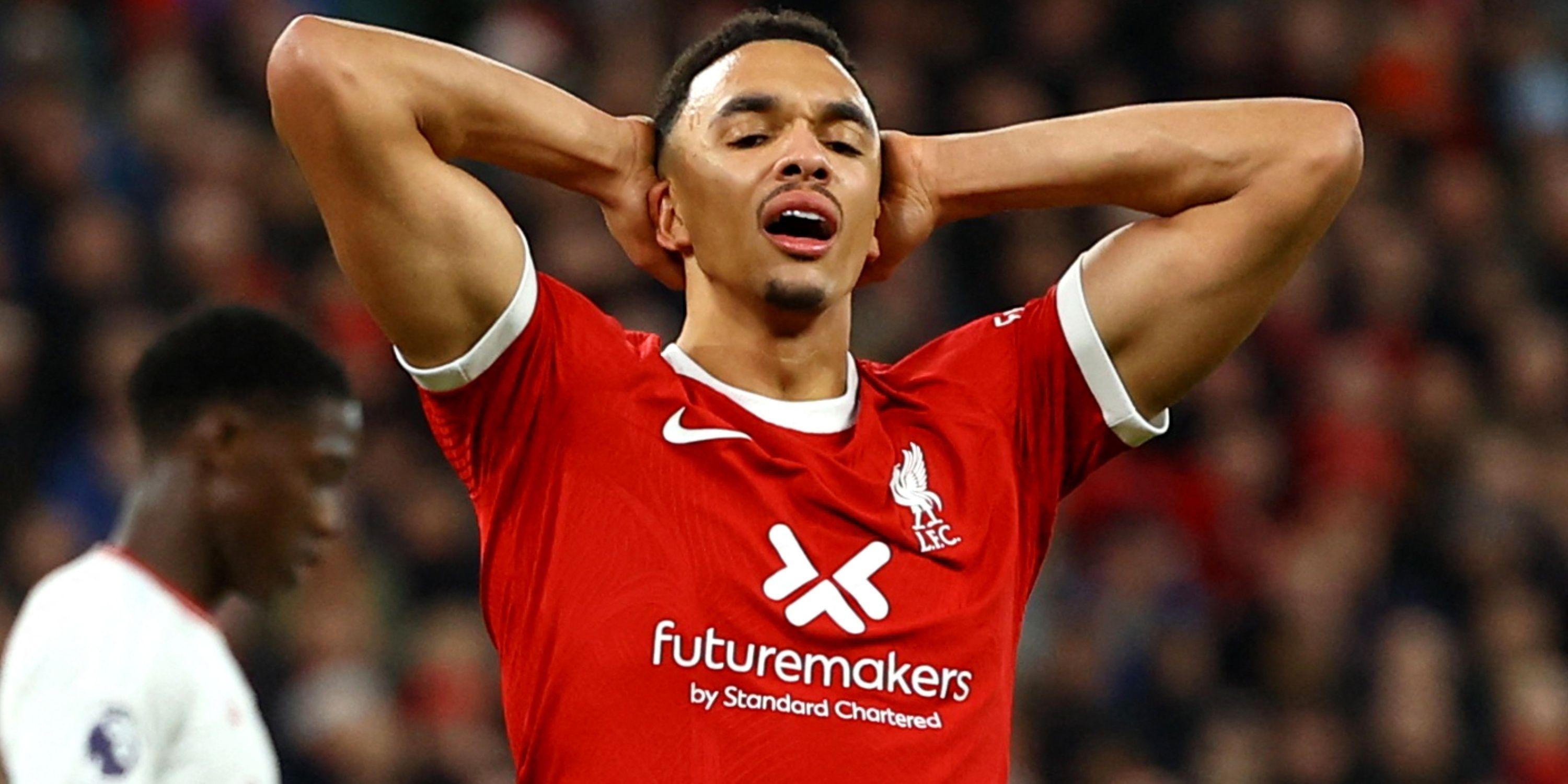 Trent Alexander-Arnold looks upset while in action for Liverpool