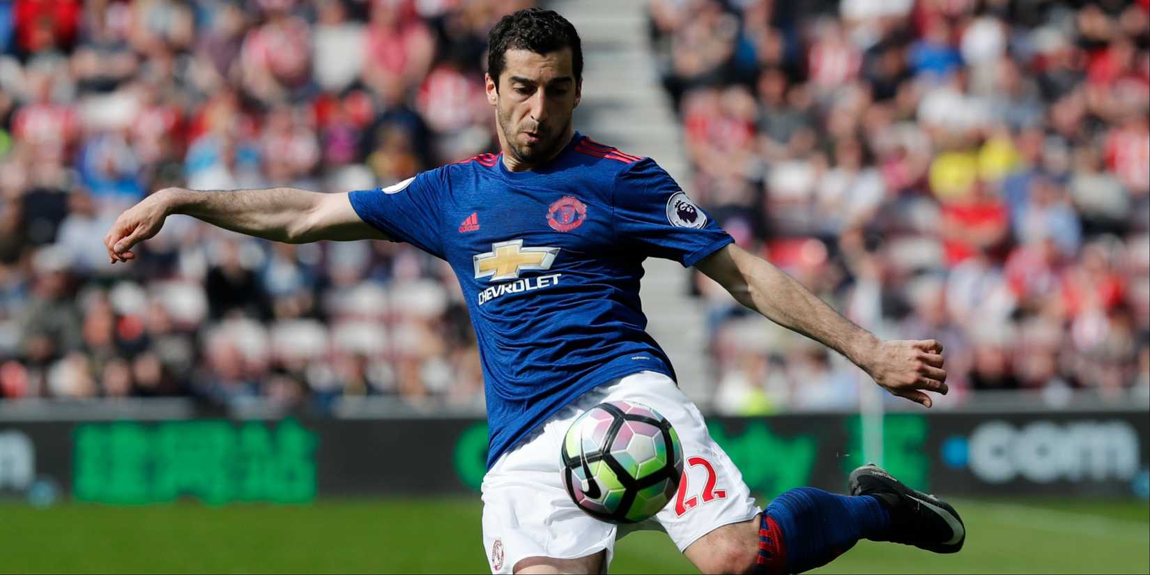 Henrikh Mkhitaryan kicking the ball