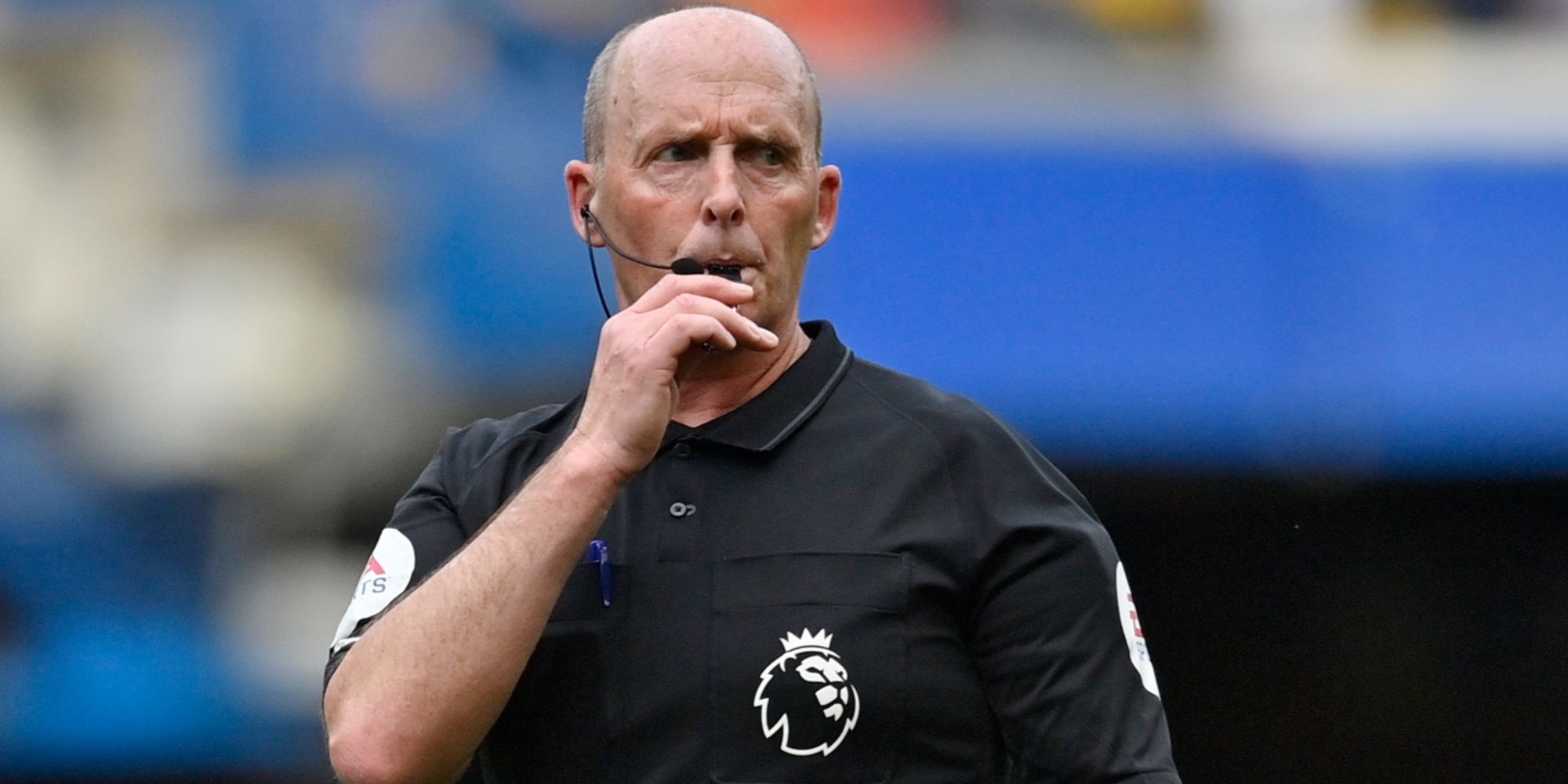 Referee Mike Dean in action