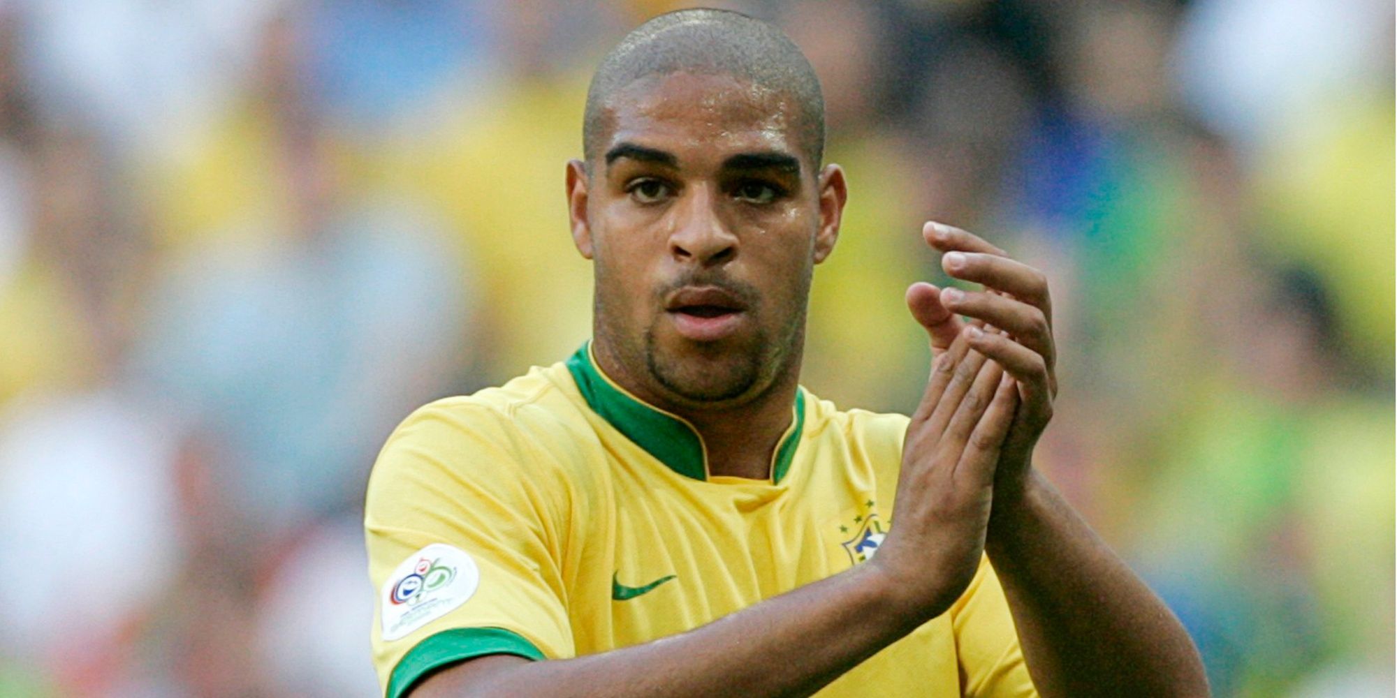 Brazil's Adriano applauding