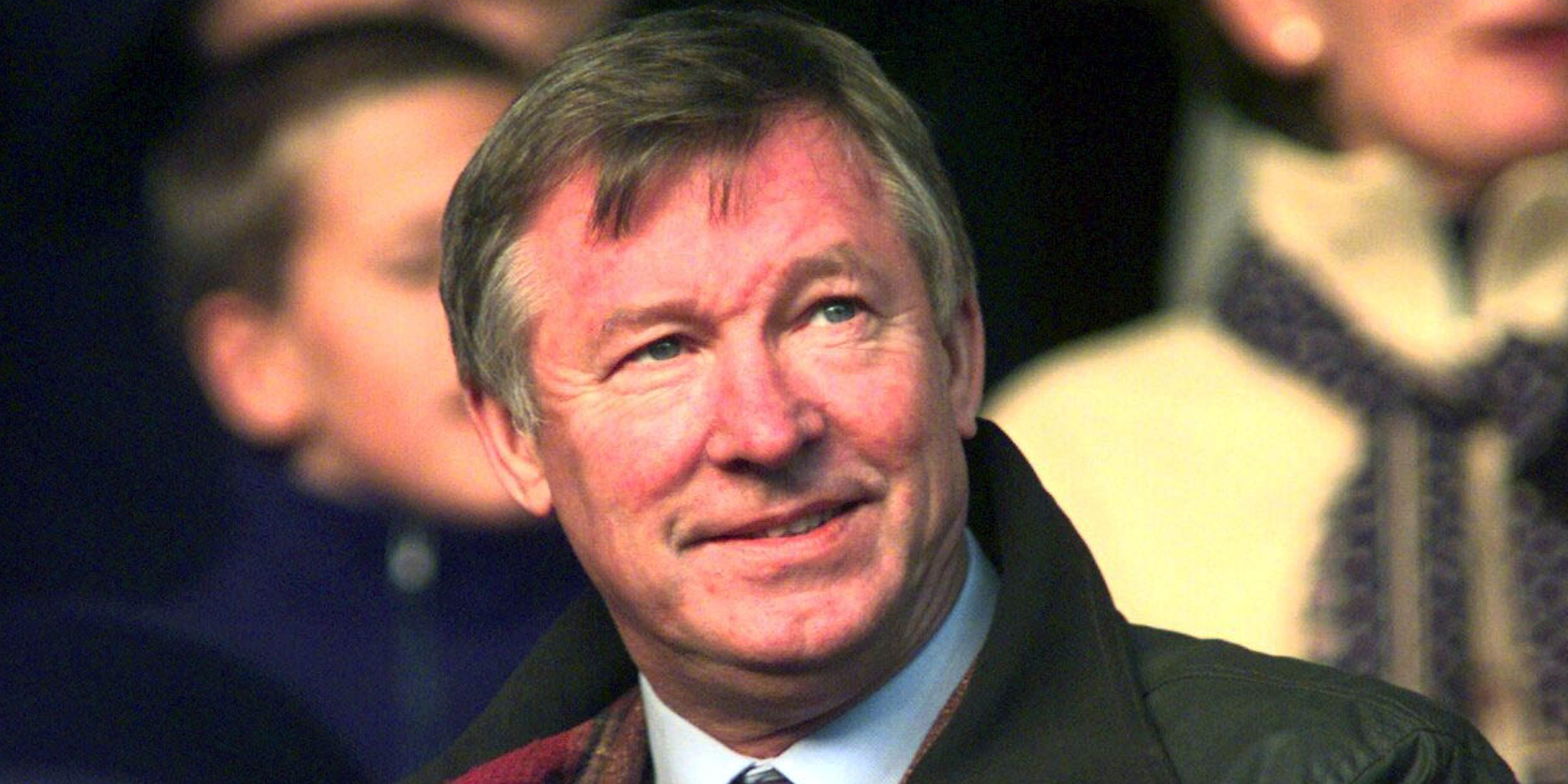 Manchester United's manager Sir Alex Ferguson at a game looking on