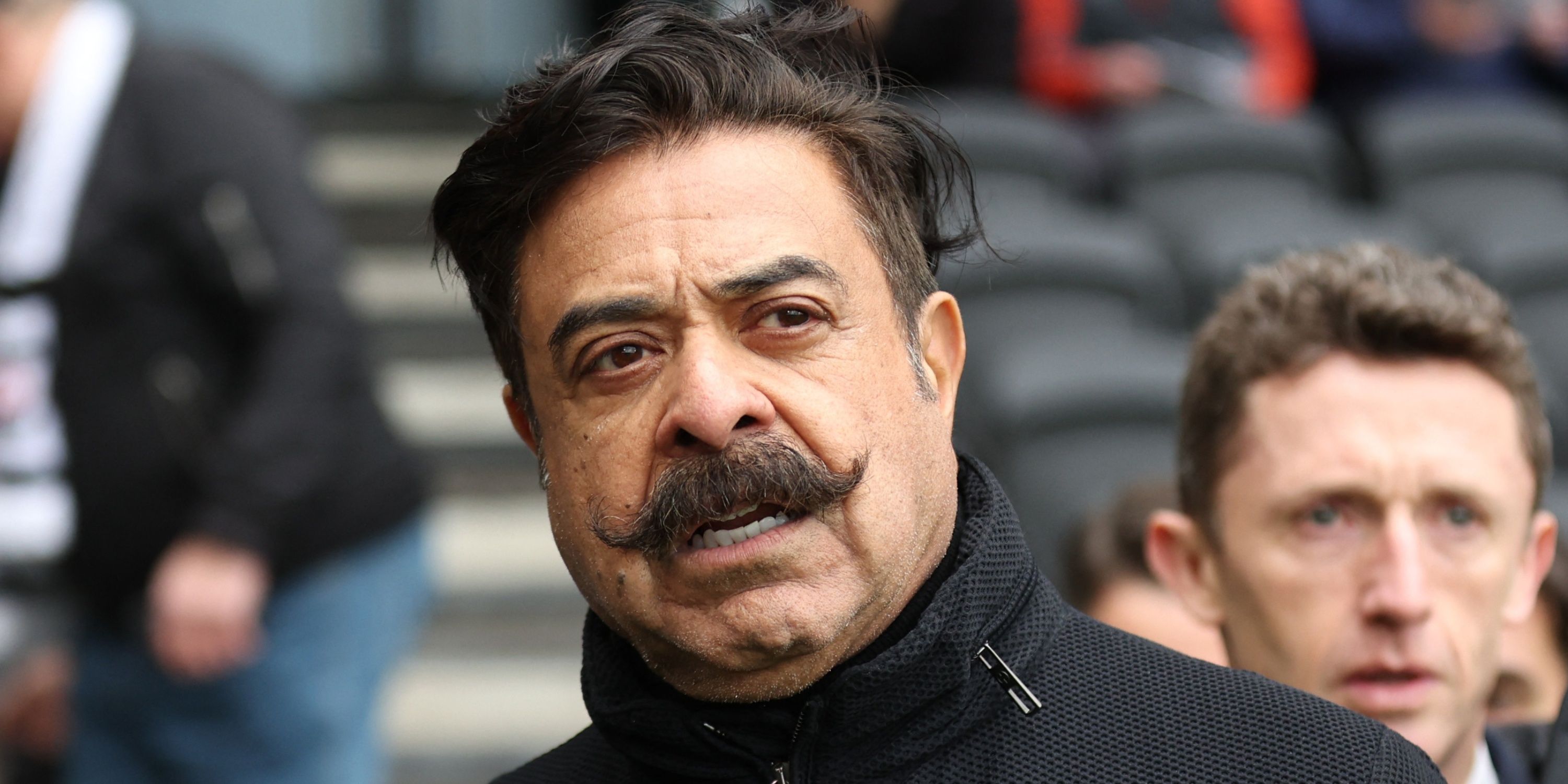 Fulham owner Shahid Khan is pictured inside their stadium