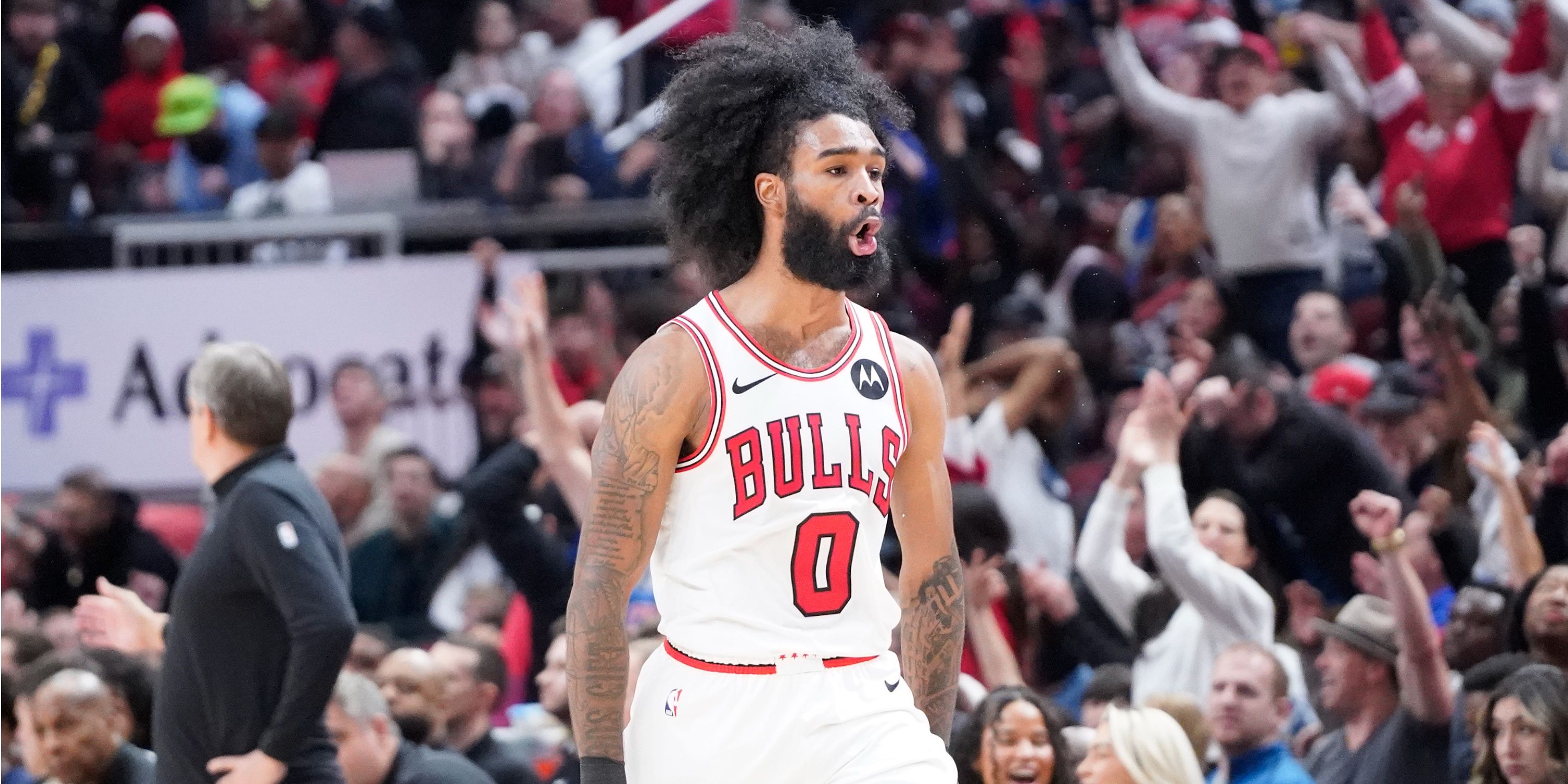 Bulls guard Coby White celebrates in front of crowd