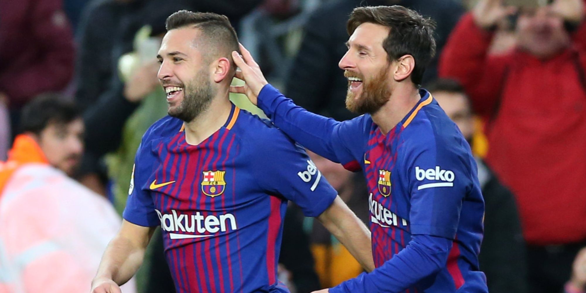 Jordi Alba and Lionel Messi celebrate