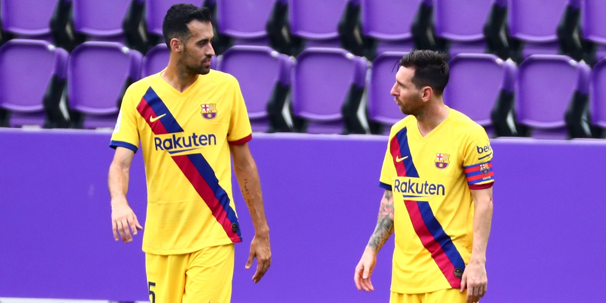 Sergio Busquets and Lionel Messi celebrate