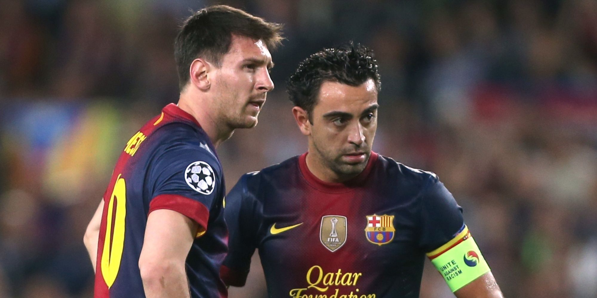 Xavi and Lionel Messi in action for Barcelona