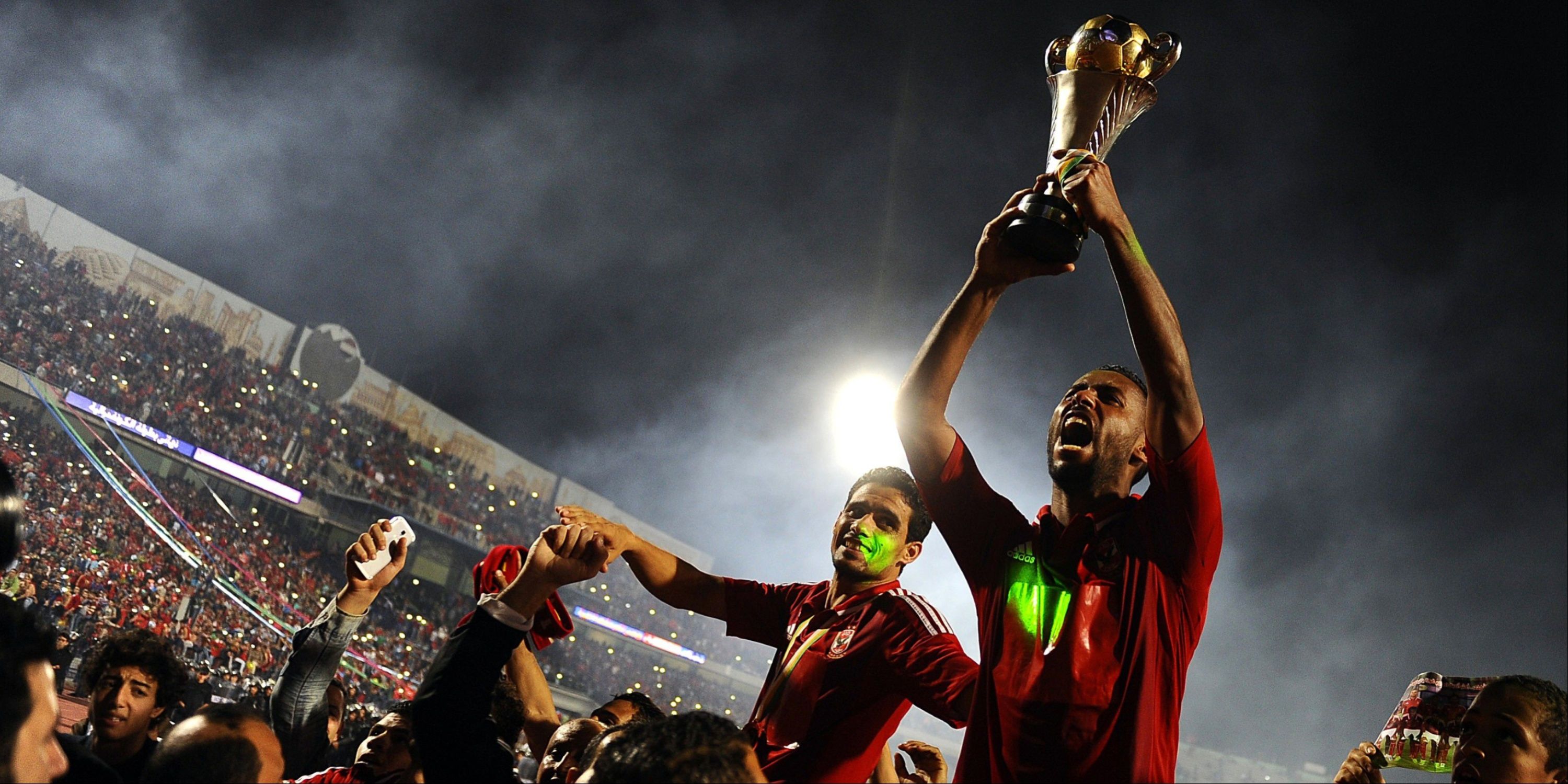 Hossam Ashour lifts the trophy