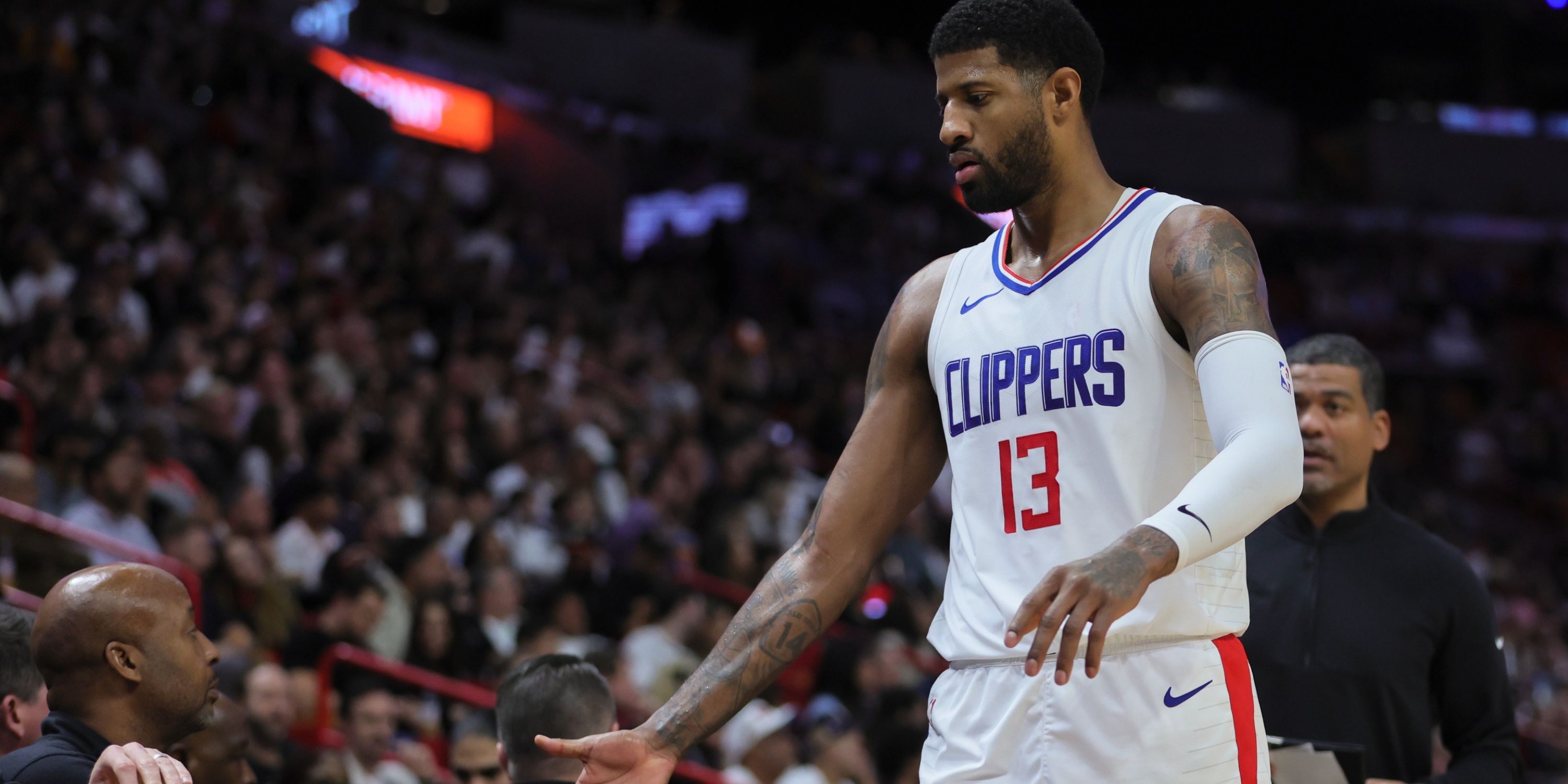 Clippers star Paul George walks over to bench