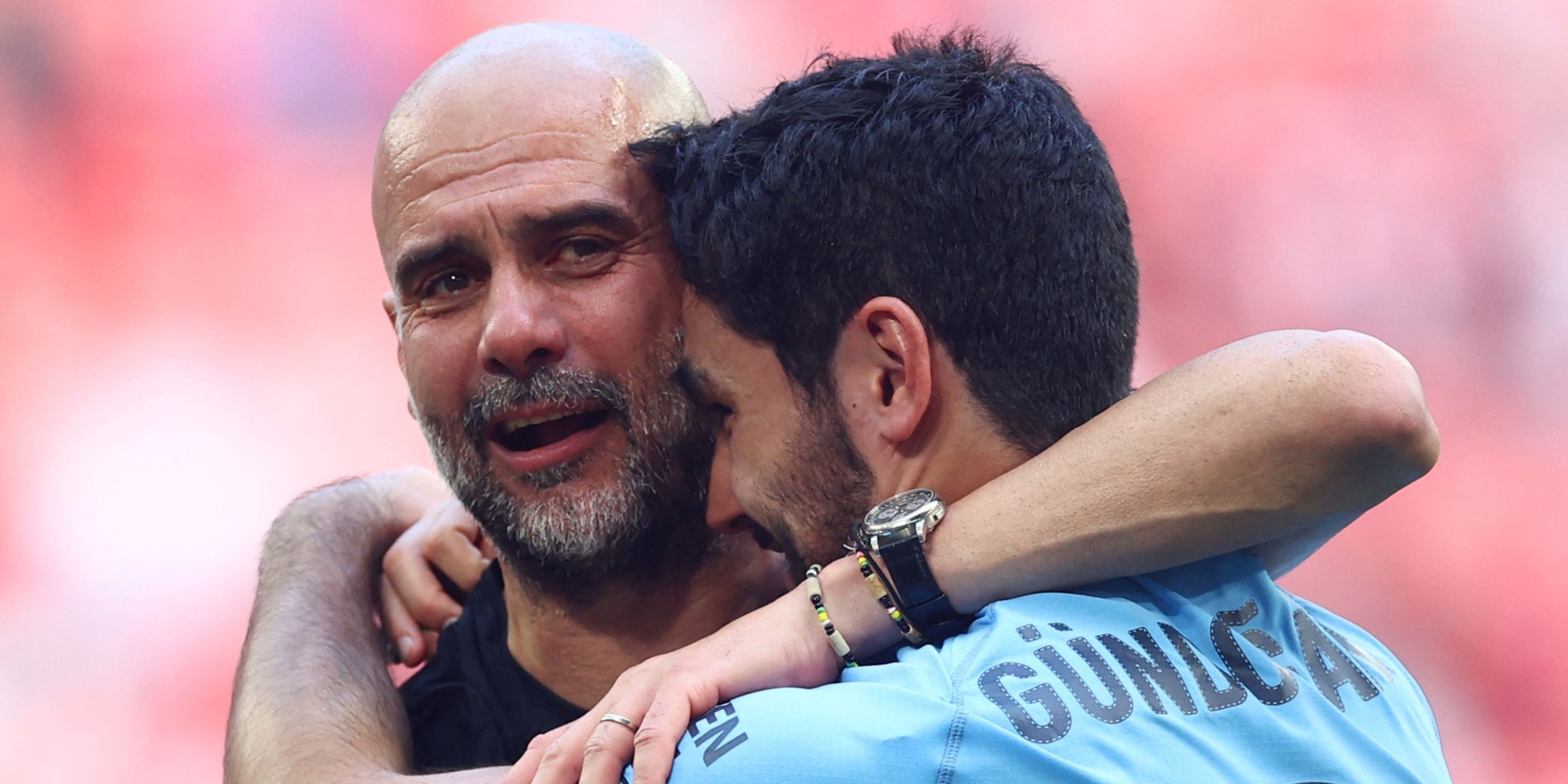 Gundogan and Guardiola hugging in the 2023 FA Cup final