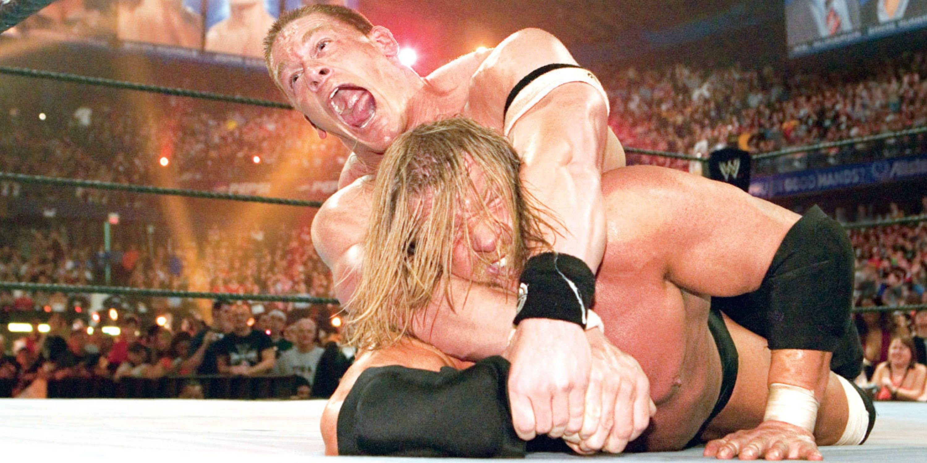 John Cena locks Triple H in the STFU at WWE WrestleMania 22