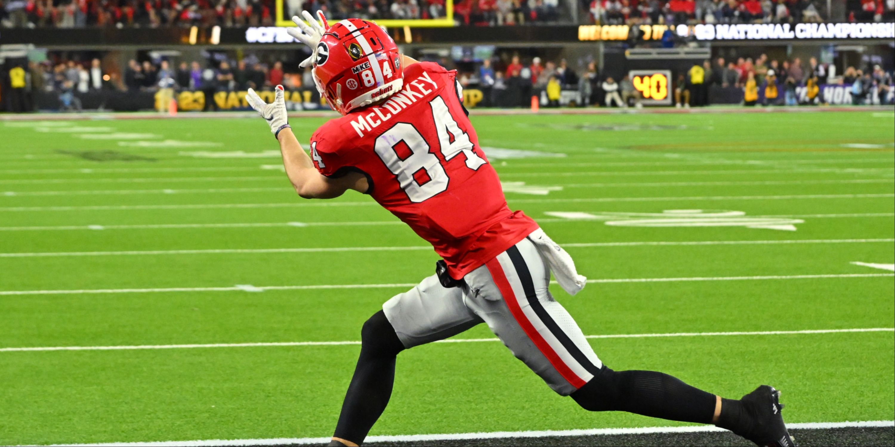 Ladd McConkey making a catch in the 2023 national championship game