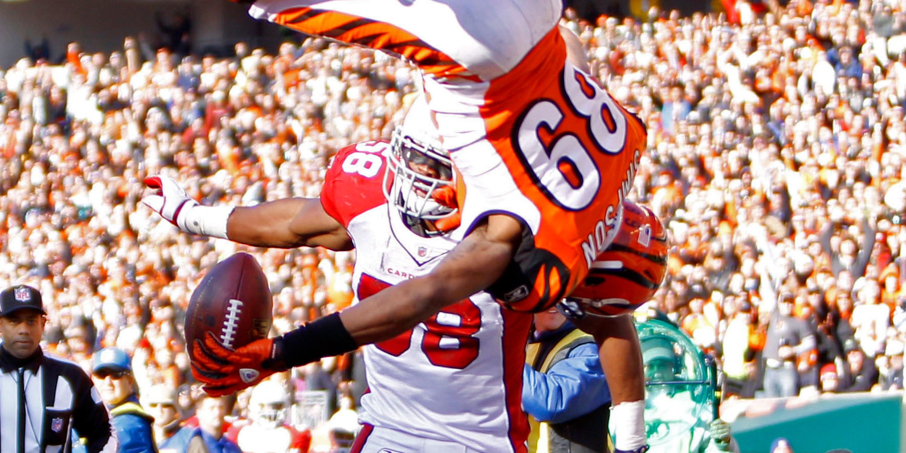 Jerome Simpson front-flips for a touchdown