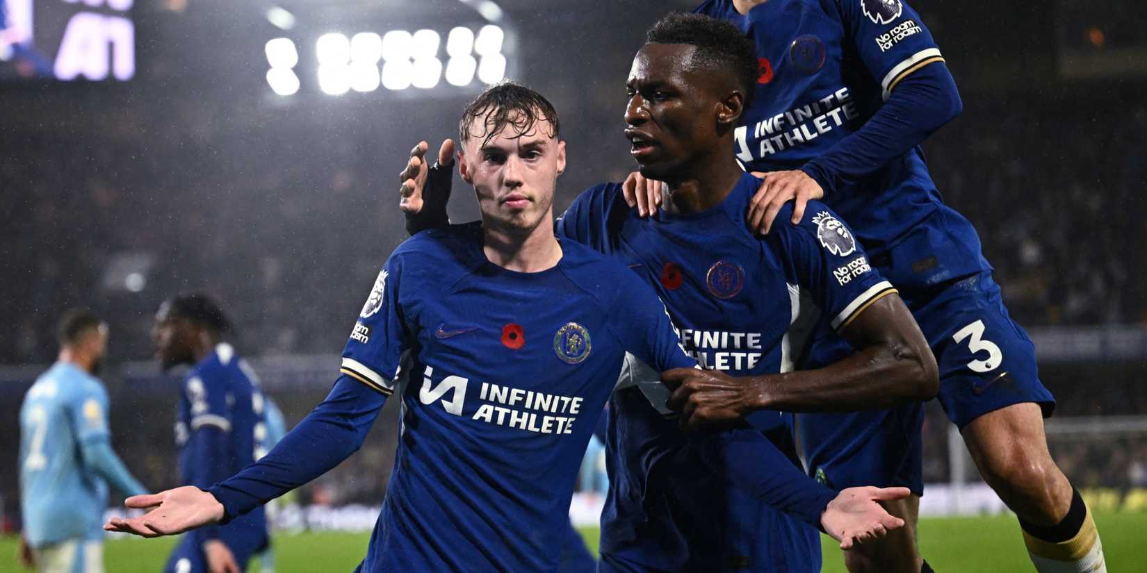 Chelsea's Cole Palmer celebrates scoring with teammate Nicolas Jackson. 