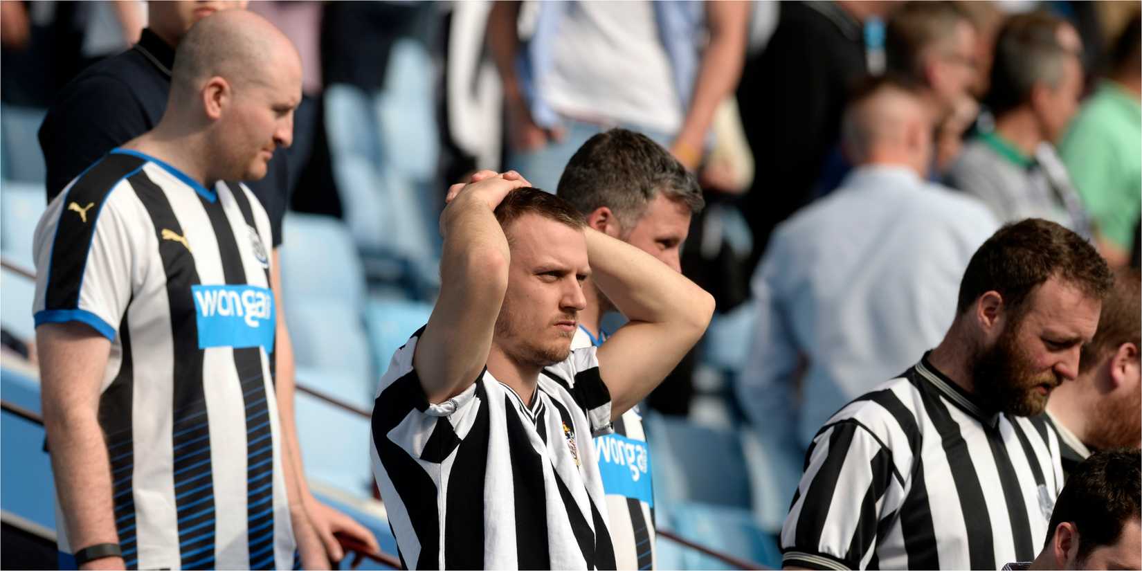 Dejected fans watch Newcastle's slide out of the Premier League in 2016