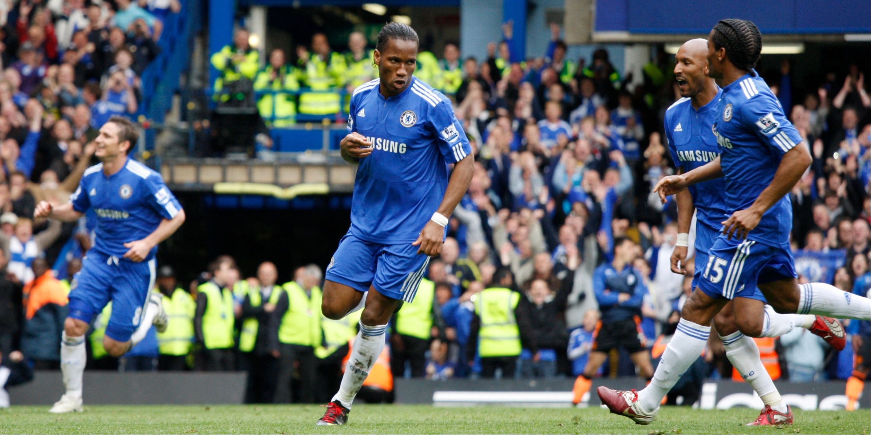 Chelsea's Didier Drogba celebrates scoring a penalty. 