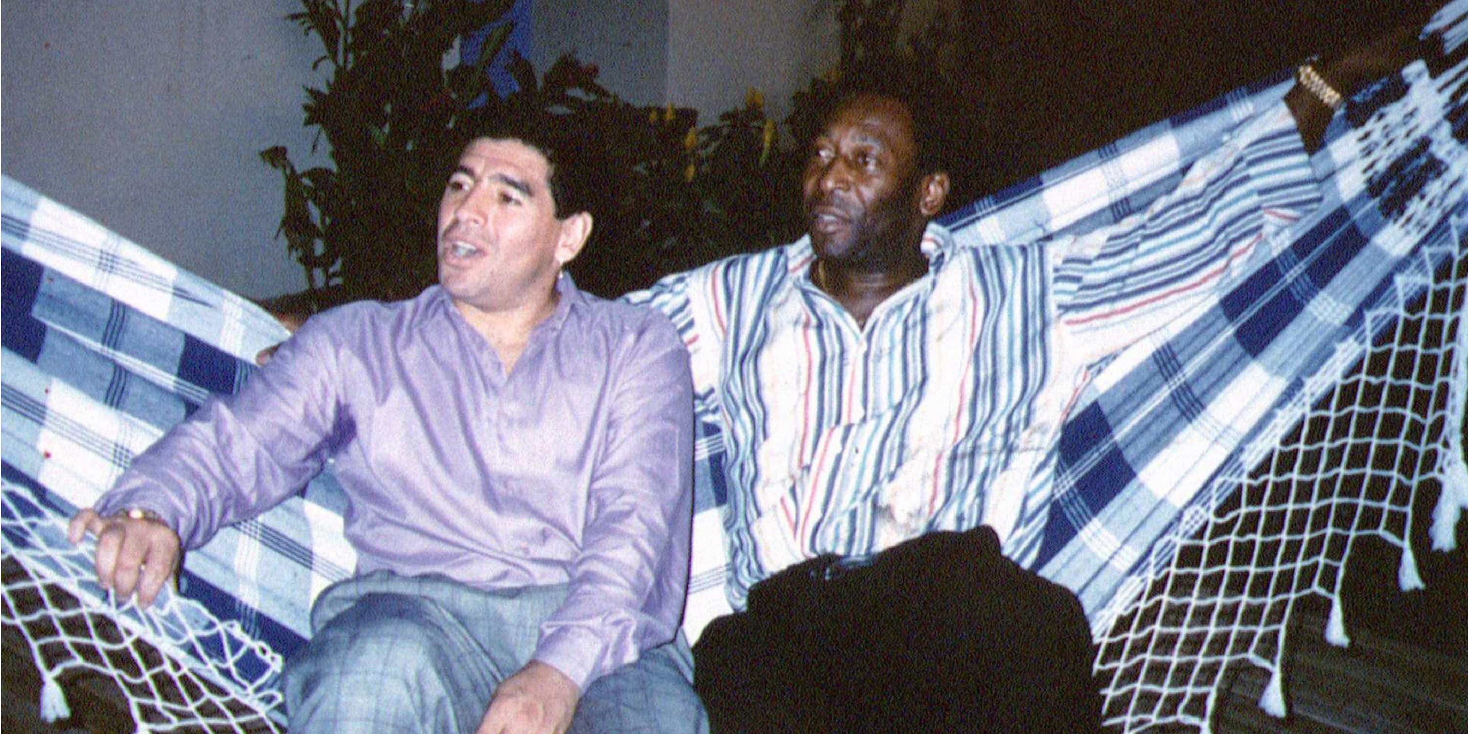 Argentina icon Diego Maradona and Brazilian legend Pele sharing a hammock