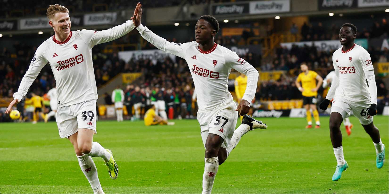 Manchester United's Kobbie Mainoo celebrates scoring with teammate Scott McTominay. 