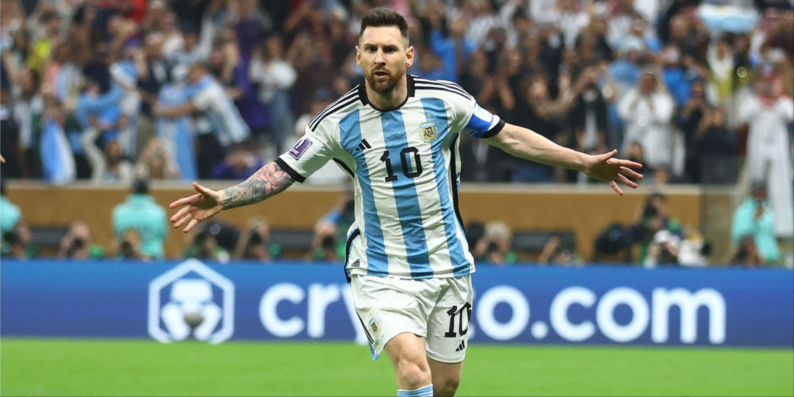 Lionel Messi celebrates scoring for Argentina. 