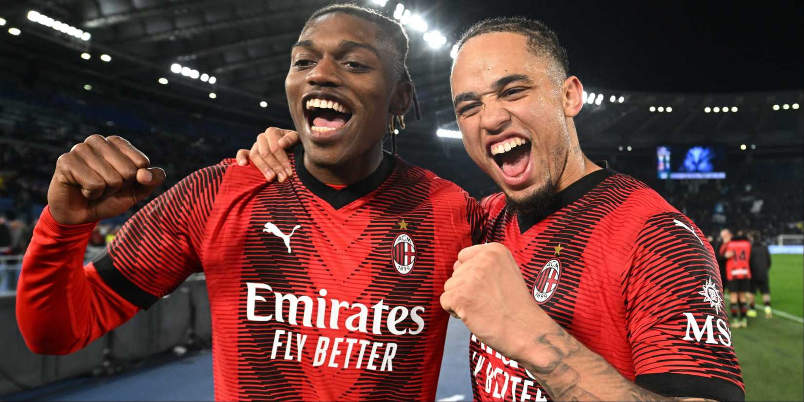 Rafael Leao and Noah Okafor celebrate