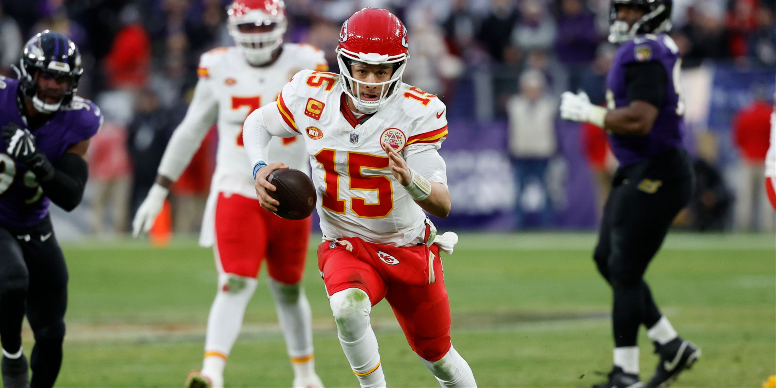 Patrick Mahomes rushes against the Baltimore Ravens in the AFC Championship game