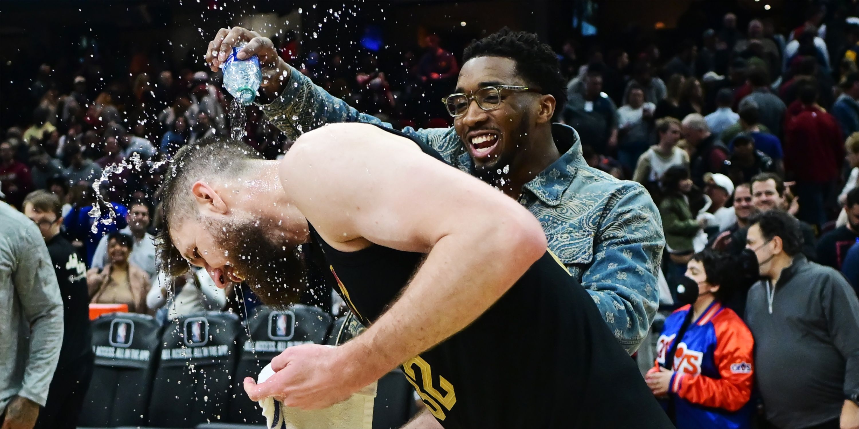 Cavs star Donovan Mitchell douses Dean Wade with water after win vs. Celtics