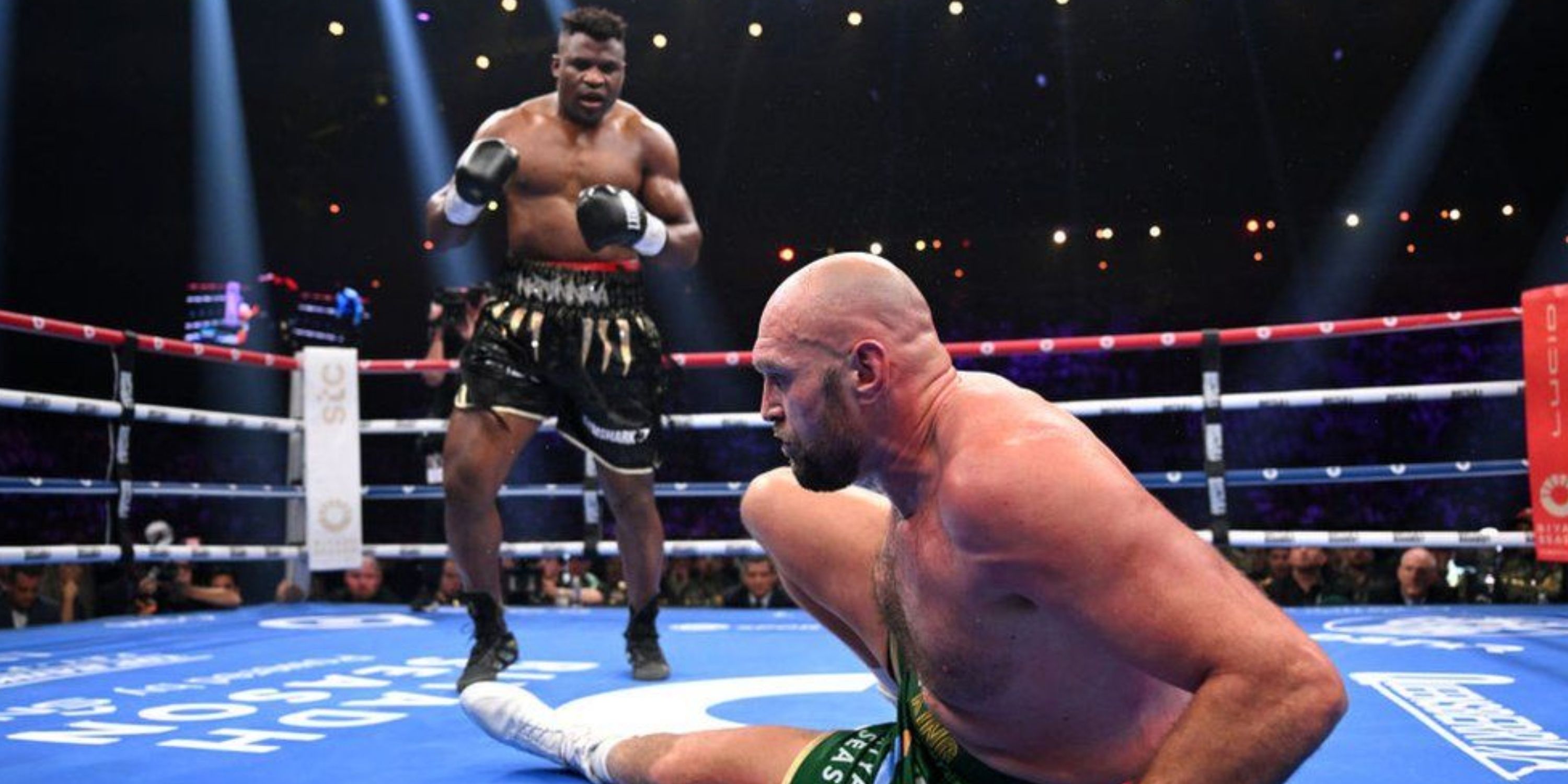 Francis Ngannou knocks Tyson Fury down