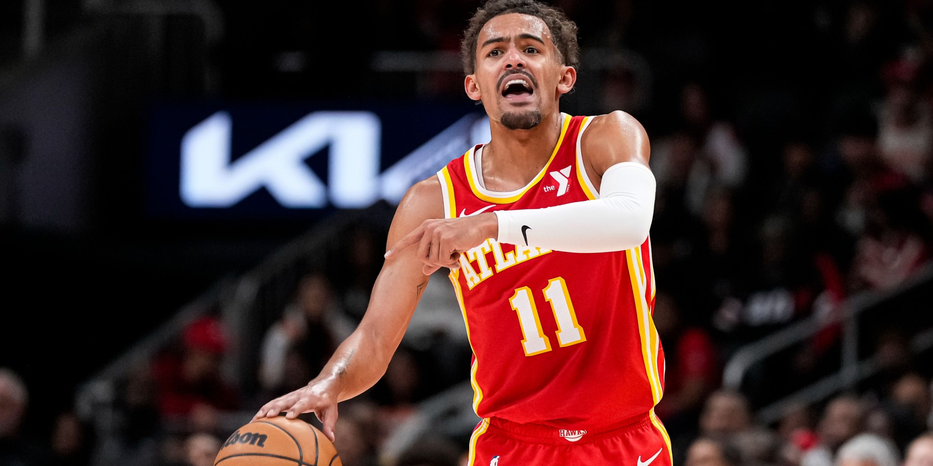 Hawks guard Trae Young directs the offense