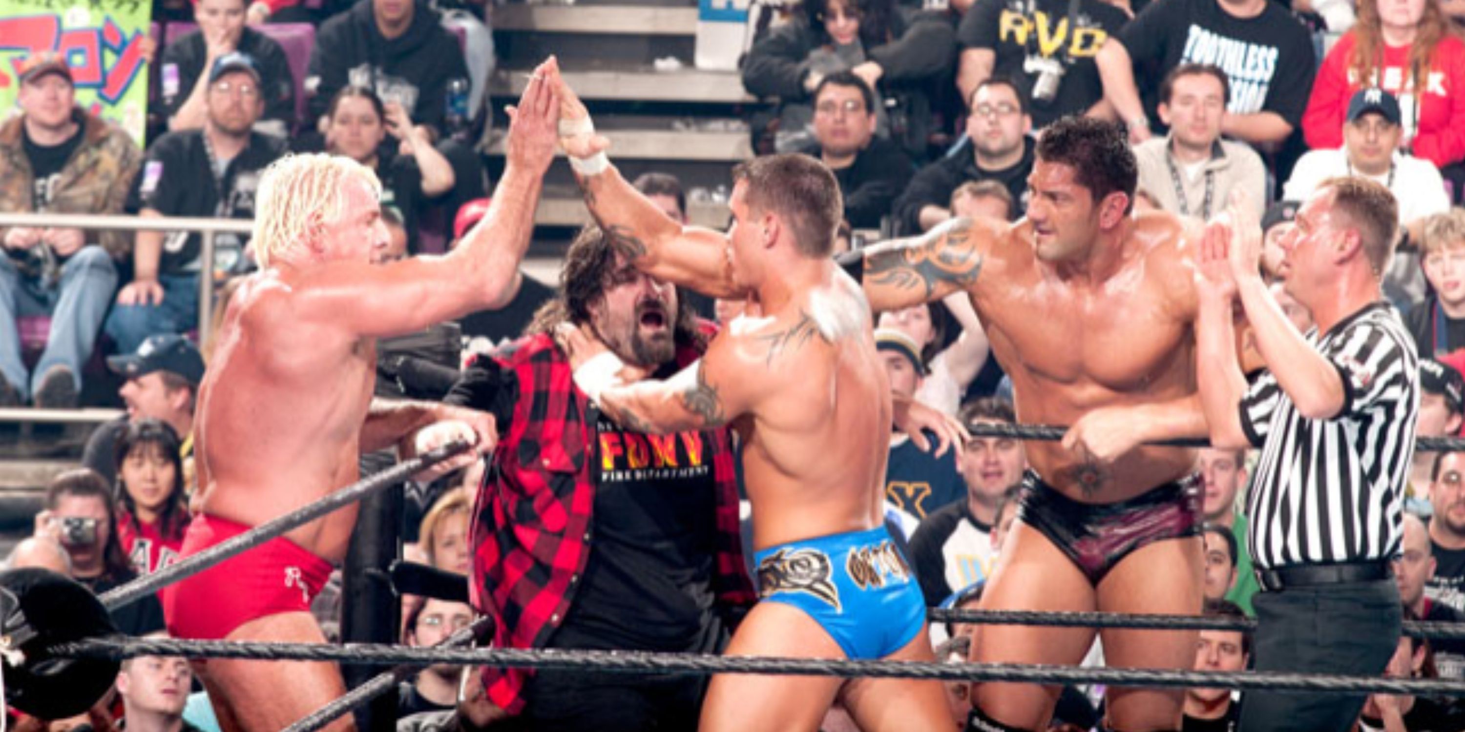 Mick Foley and The Rock vs Evolution