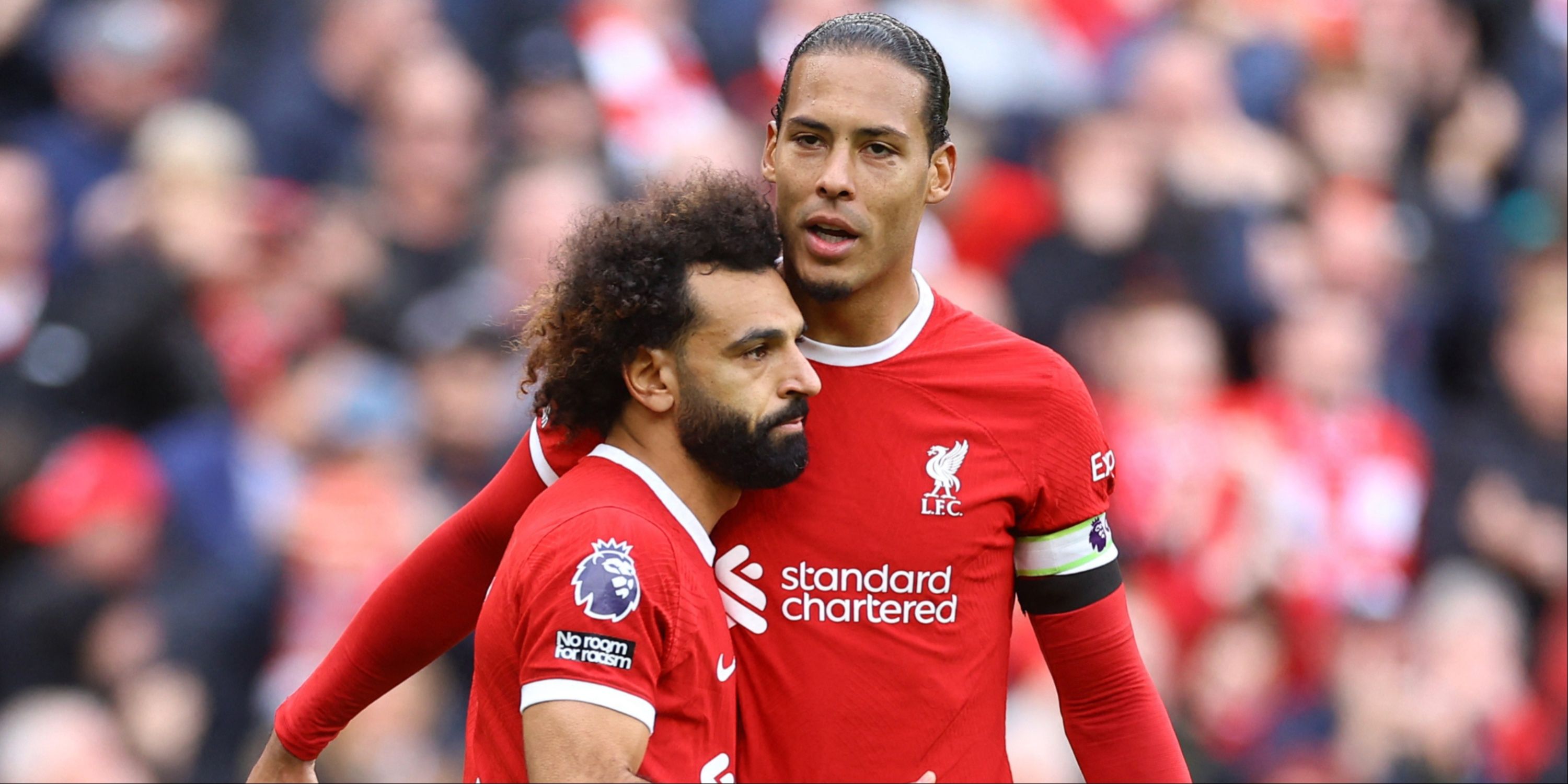 Virgil van Dijk and Mohamed Salah celebrate a Liverpool goal