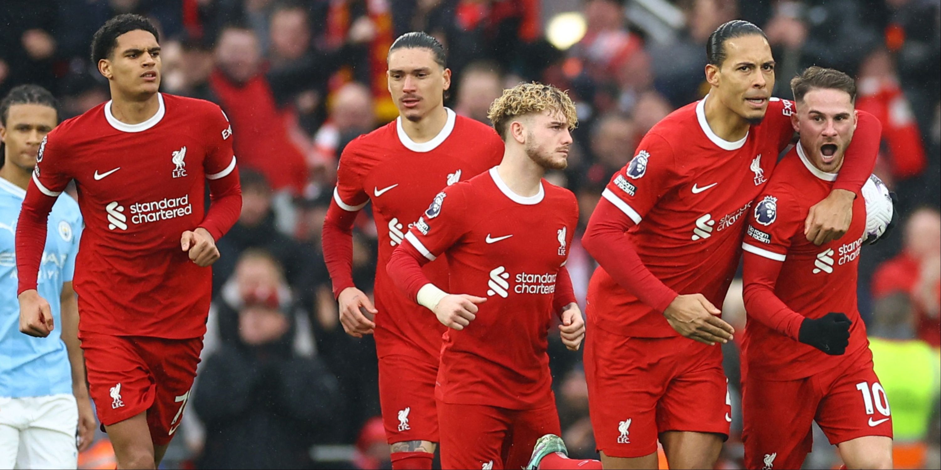 Liverpool players celebrate Alexis Mac Allister's penalty vs Manchester City