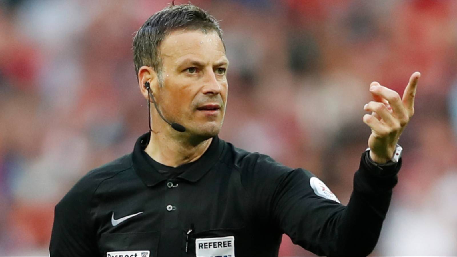 Mark Clattenburg in action