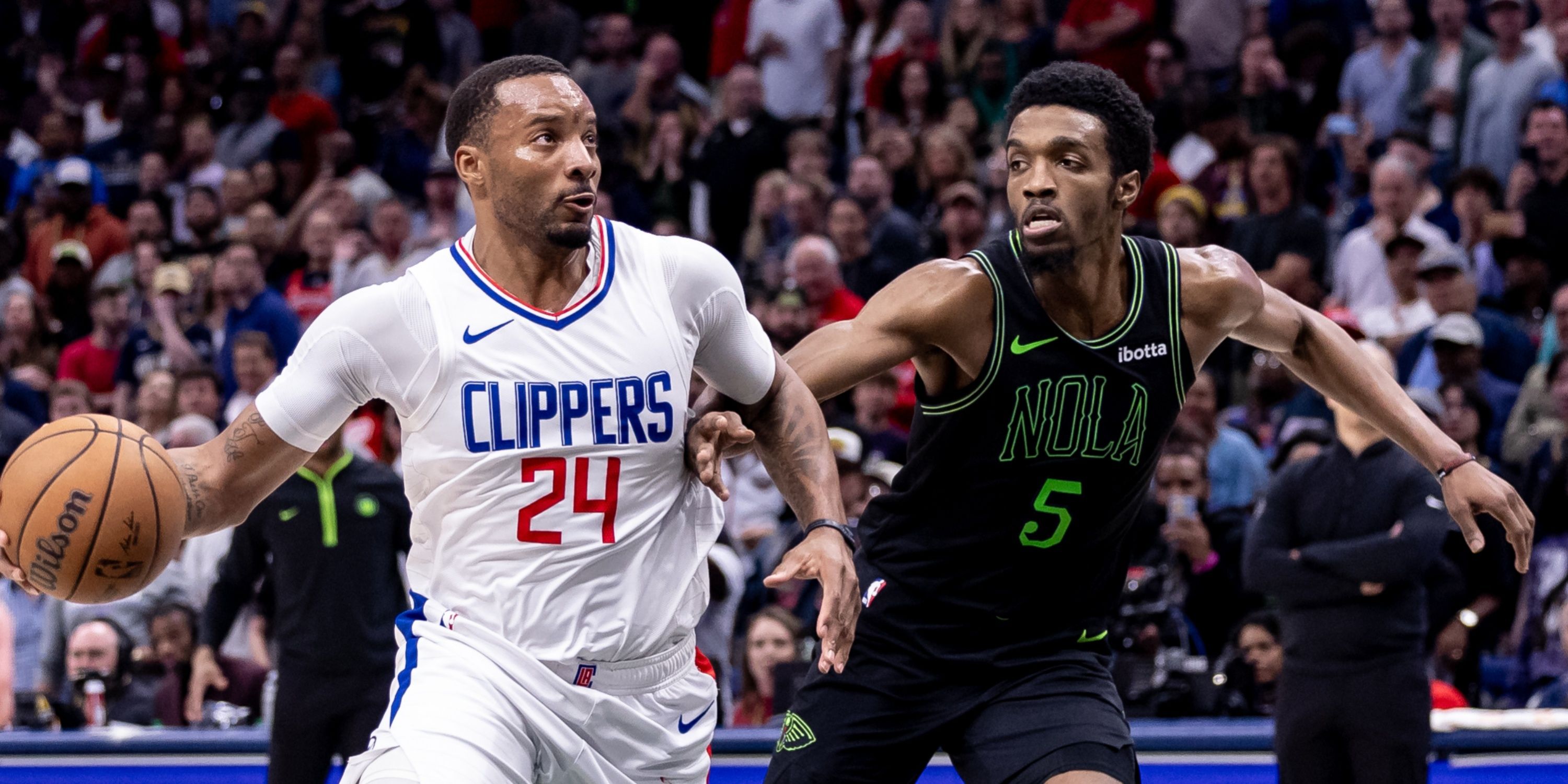 Pelicans' Herbert Jones defending Clippers' Norman Powell