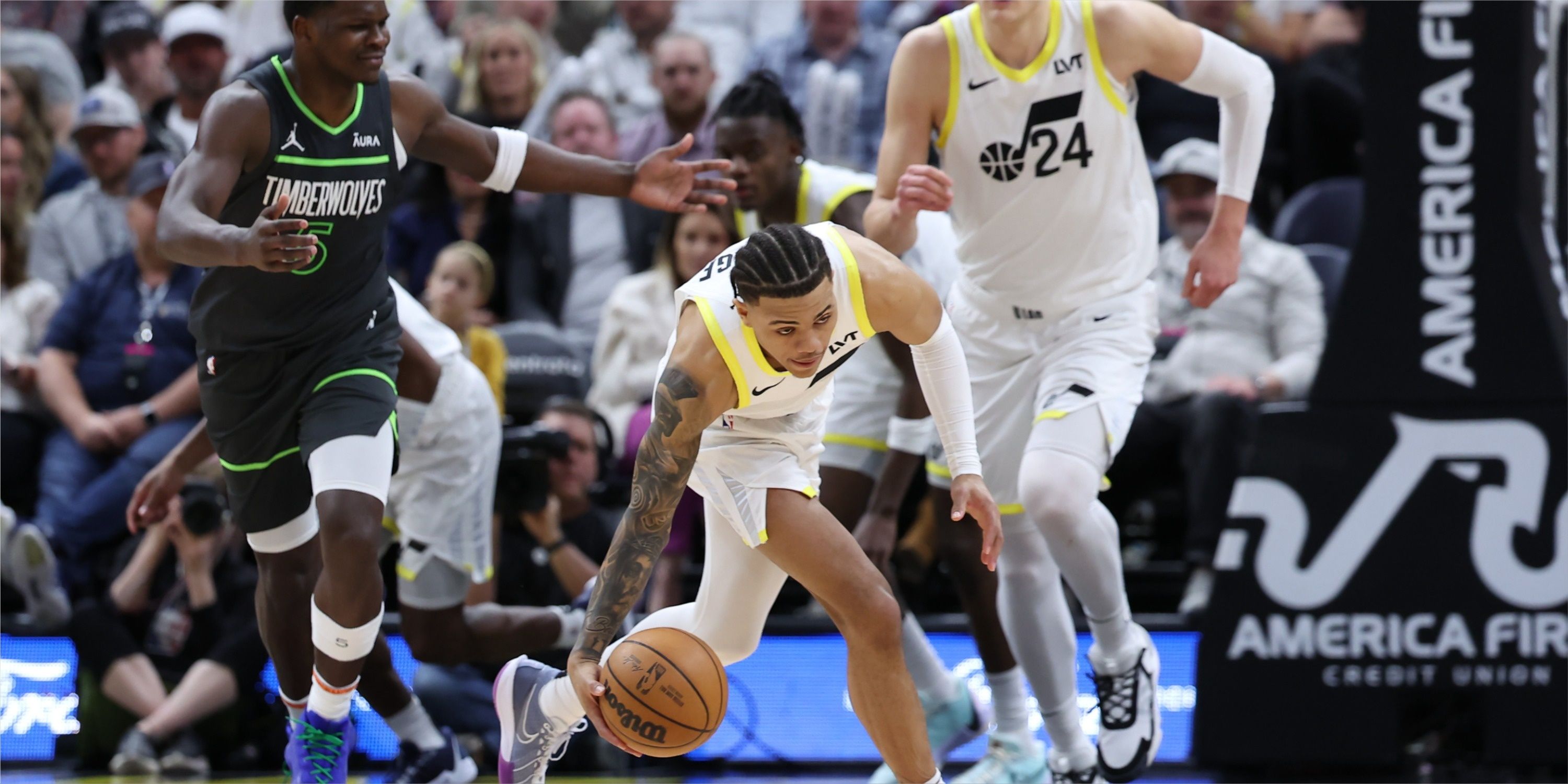 Utah Jazz guard Keyonte George dribbles up court