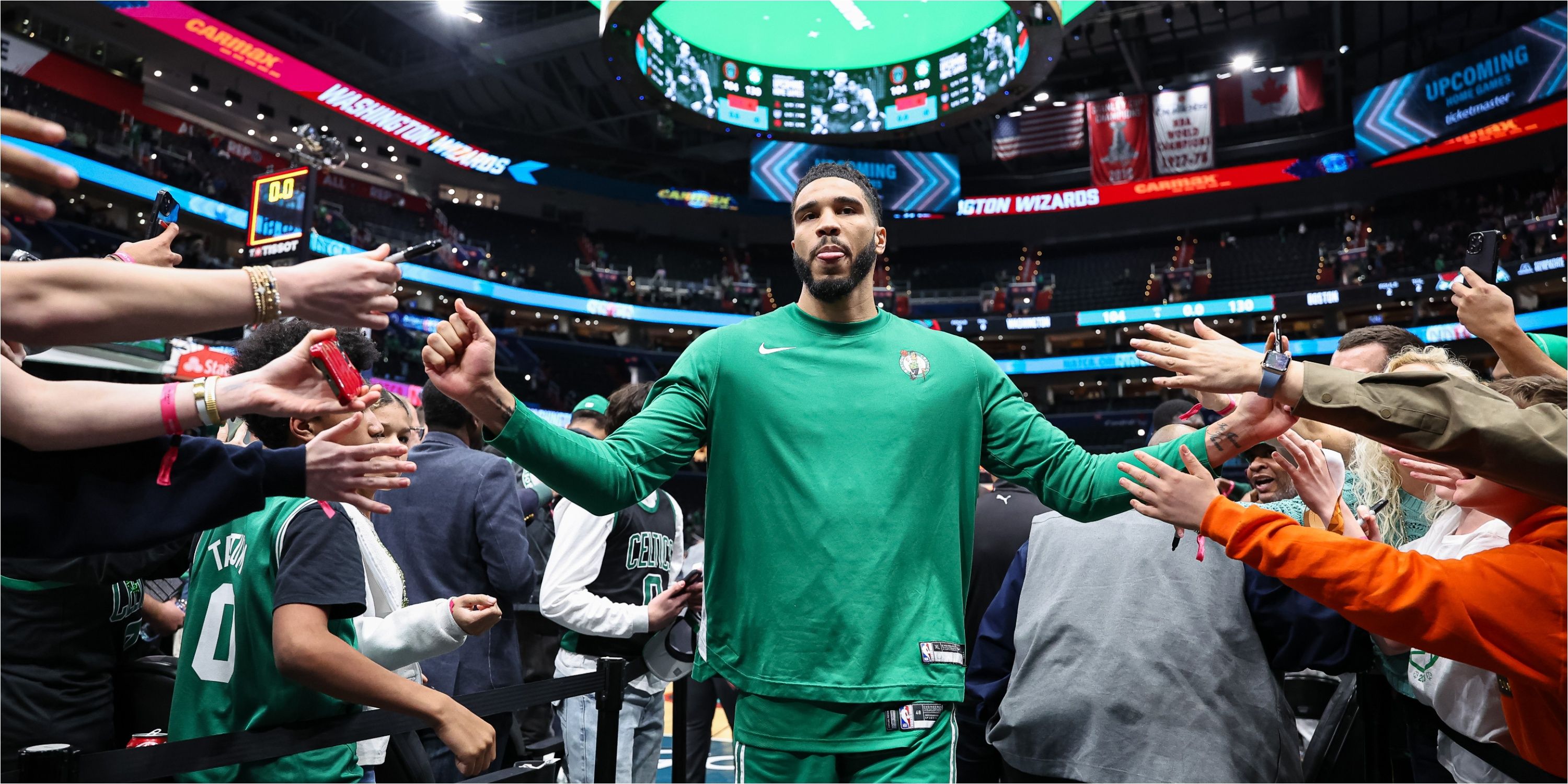 Boston Celtics forward Jayson Tatum walks into tunnel