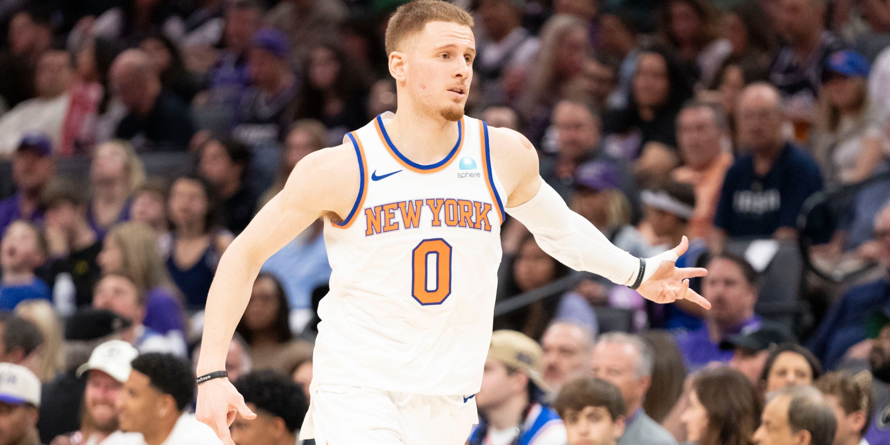 New York Knicks guard Donte DiVicenzo celebrates 3