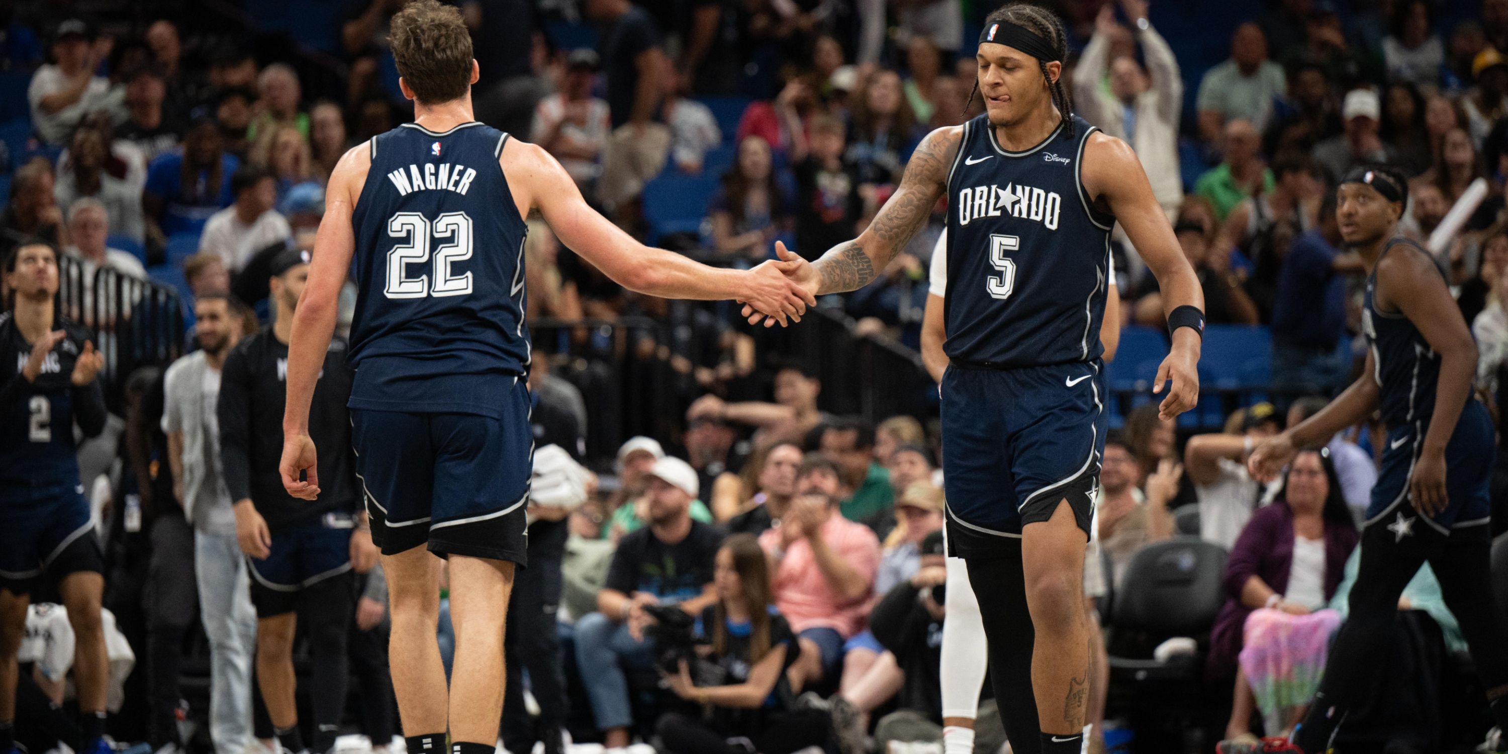 Orlando Magic forwards Paolo Banchero and Franz Wagner shake hands