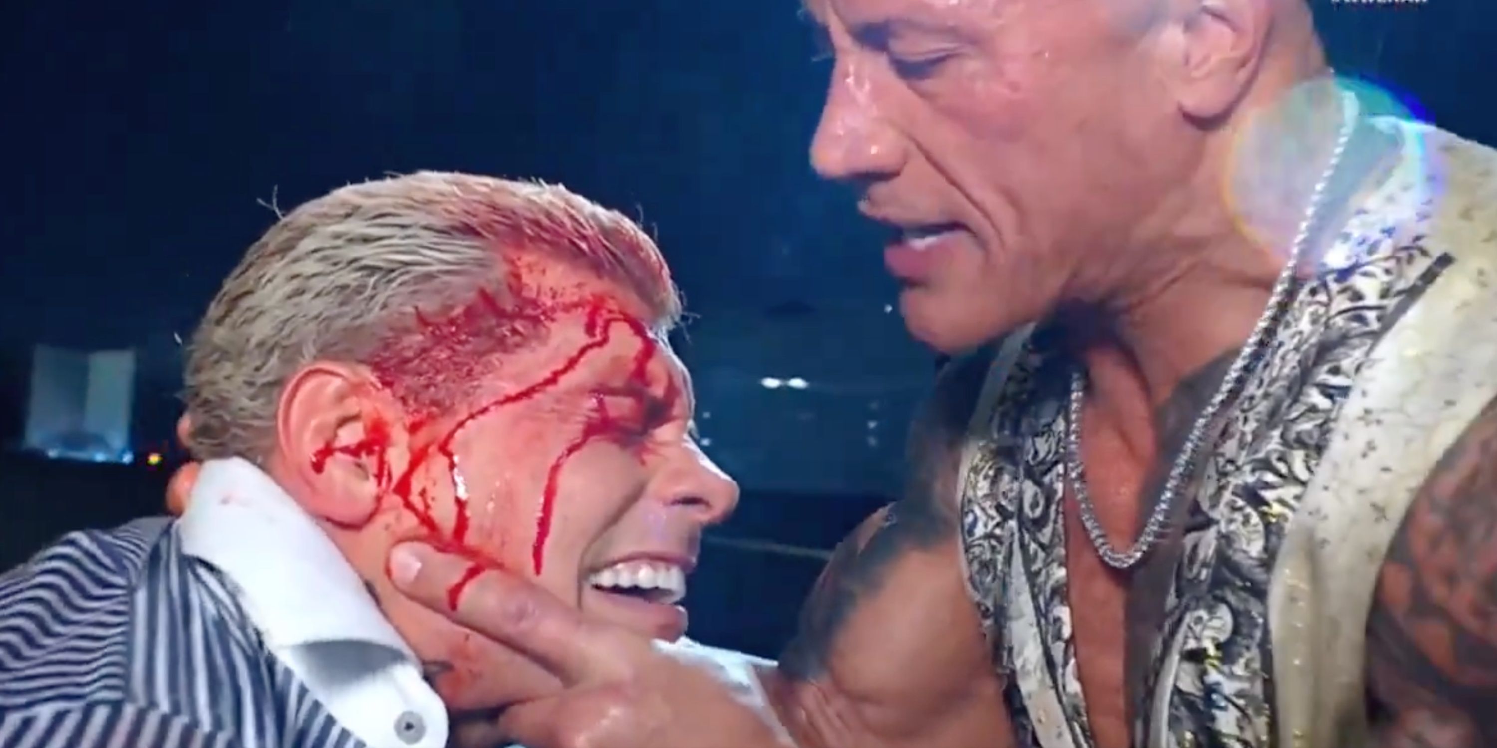 The Rock and a bloodied Cody Rhodes