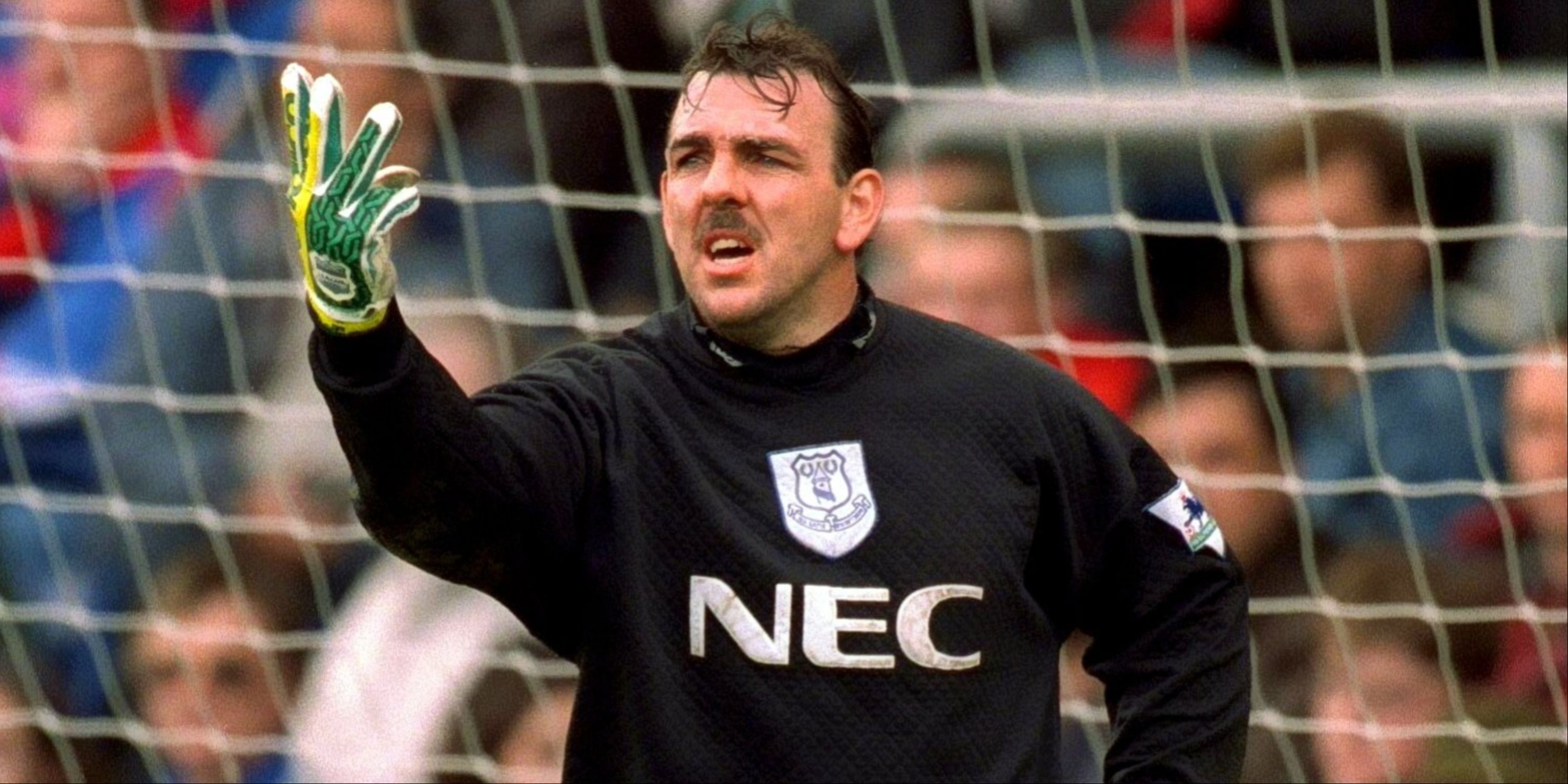 Everton goalkeeper Neville Southall instructs his teammates. 