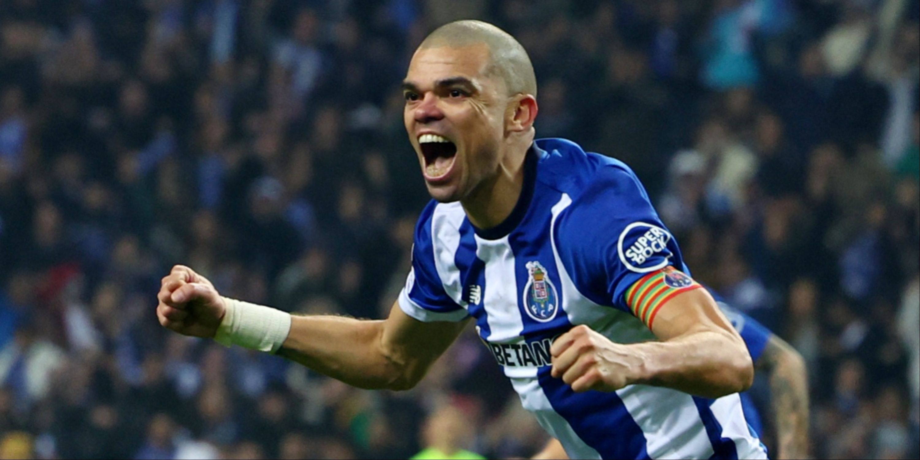 Pepe celebrates scoring for Porto against Shakhtar Donetsk.
