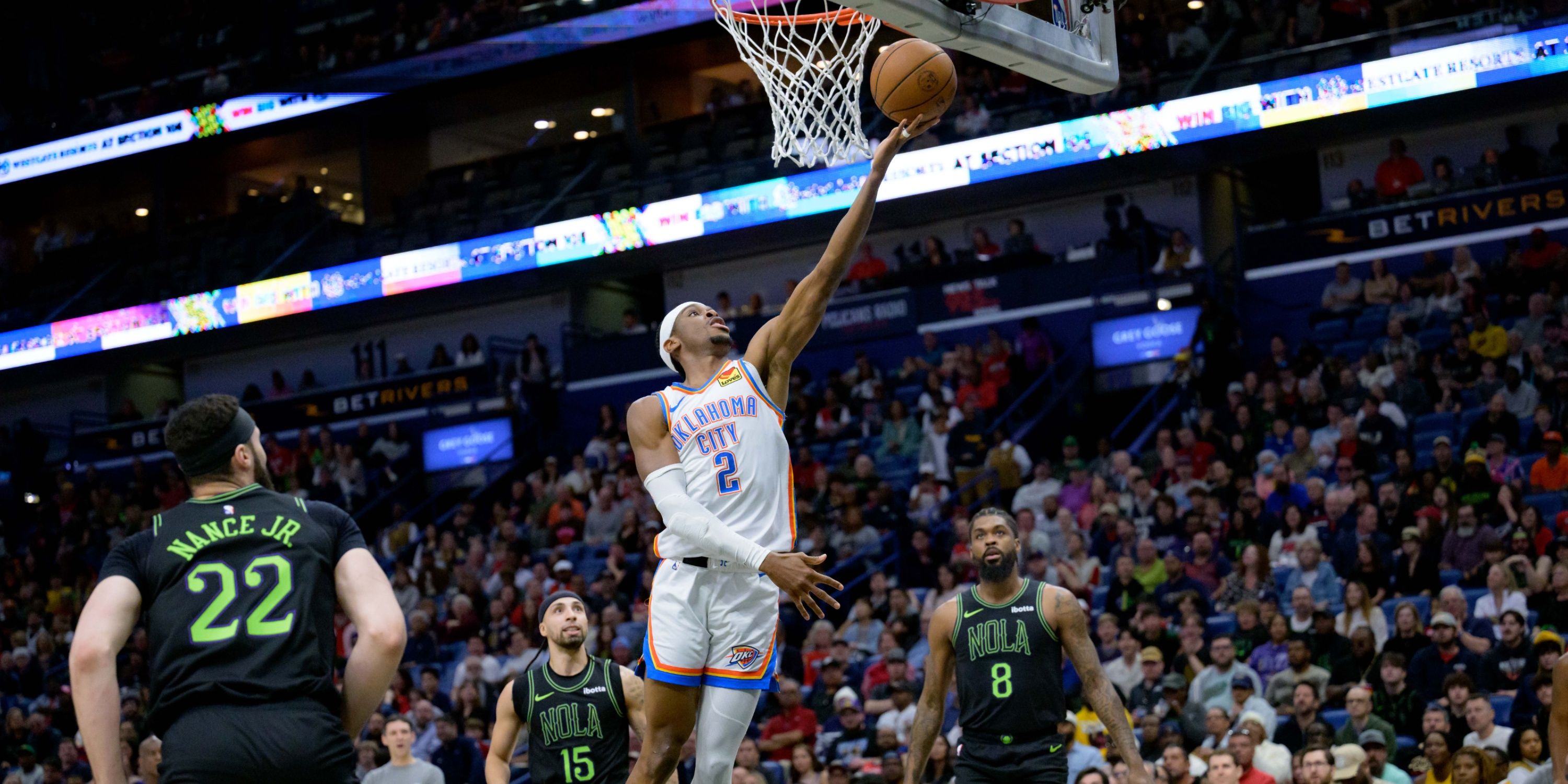 Shai Gilgeous-Alexander goes for a layup