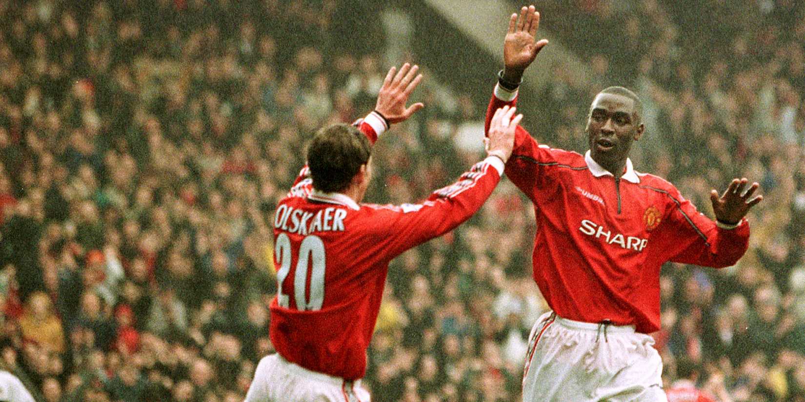 Andy Cole celebrates