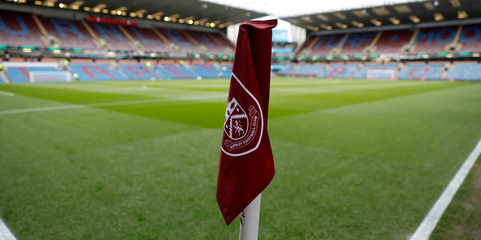 Burnley's claret badge on a club corner flag
