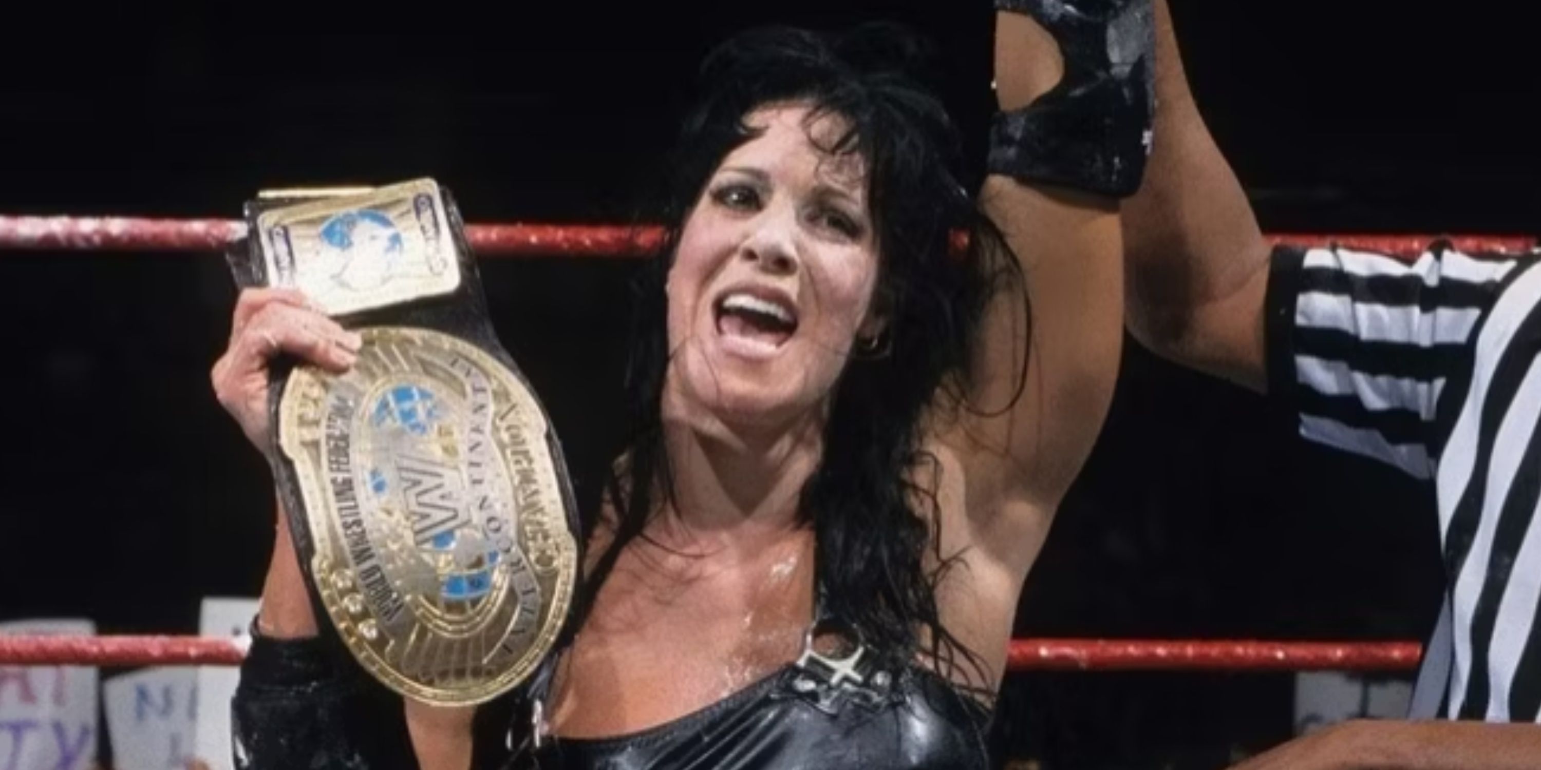 Chyna celebrates with the Intercontinental title