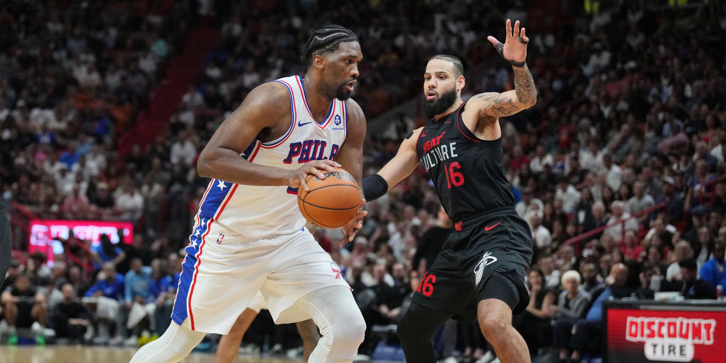 Embiid guarded by Martin