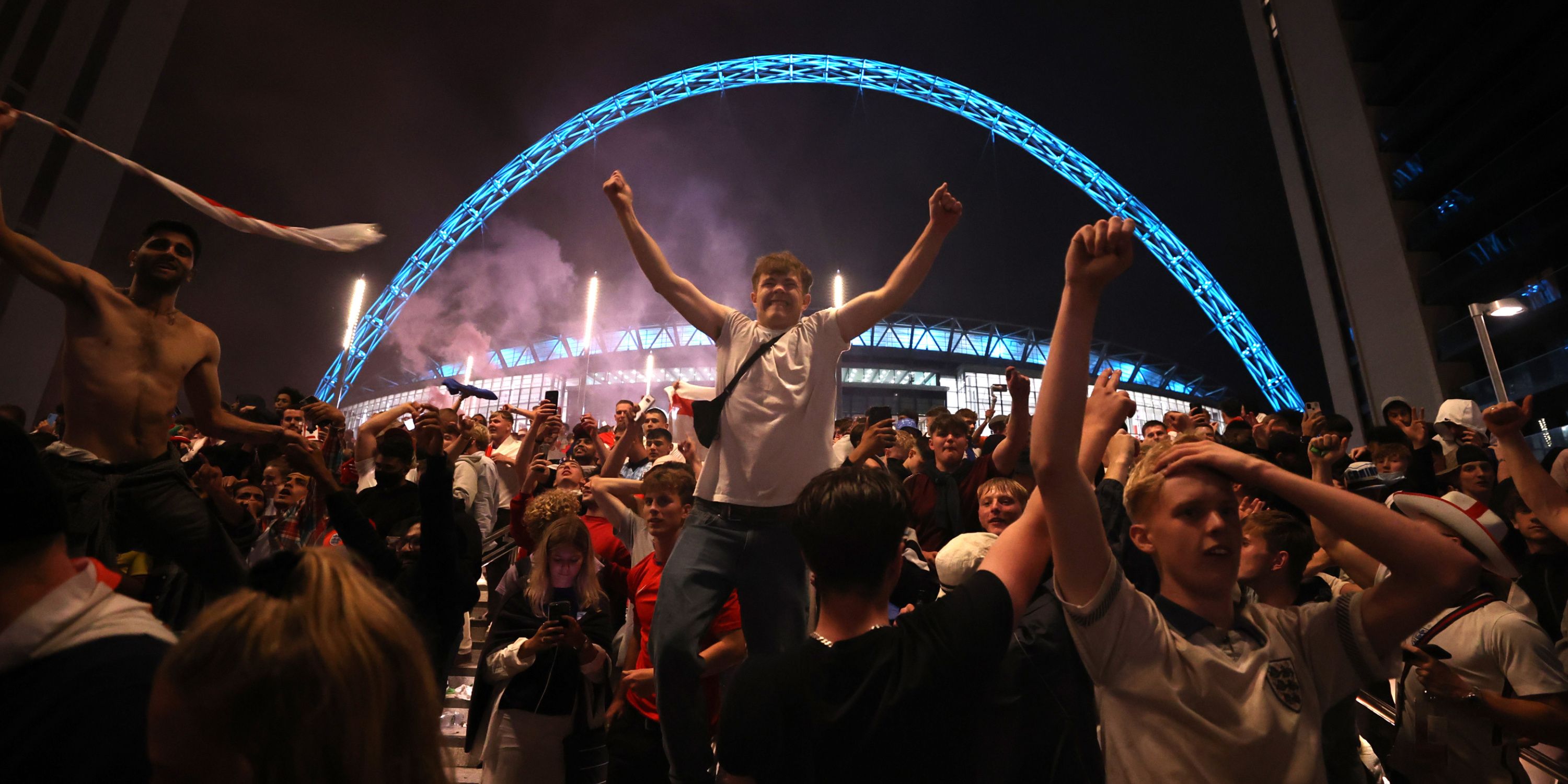 England fans celebrate in front of Wembley ahead of the Euro 2020 final