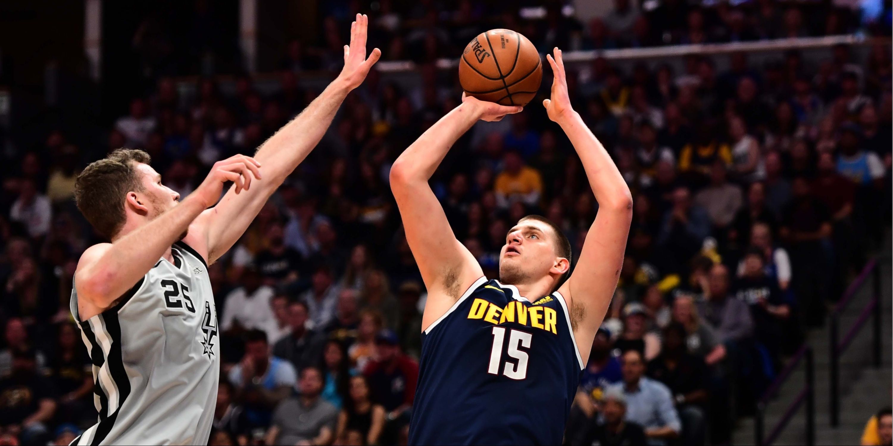 Jakob Poeltl and Nikola Jokic