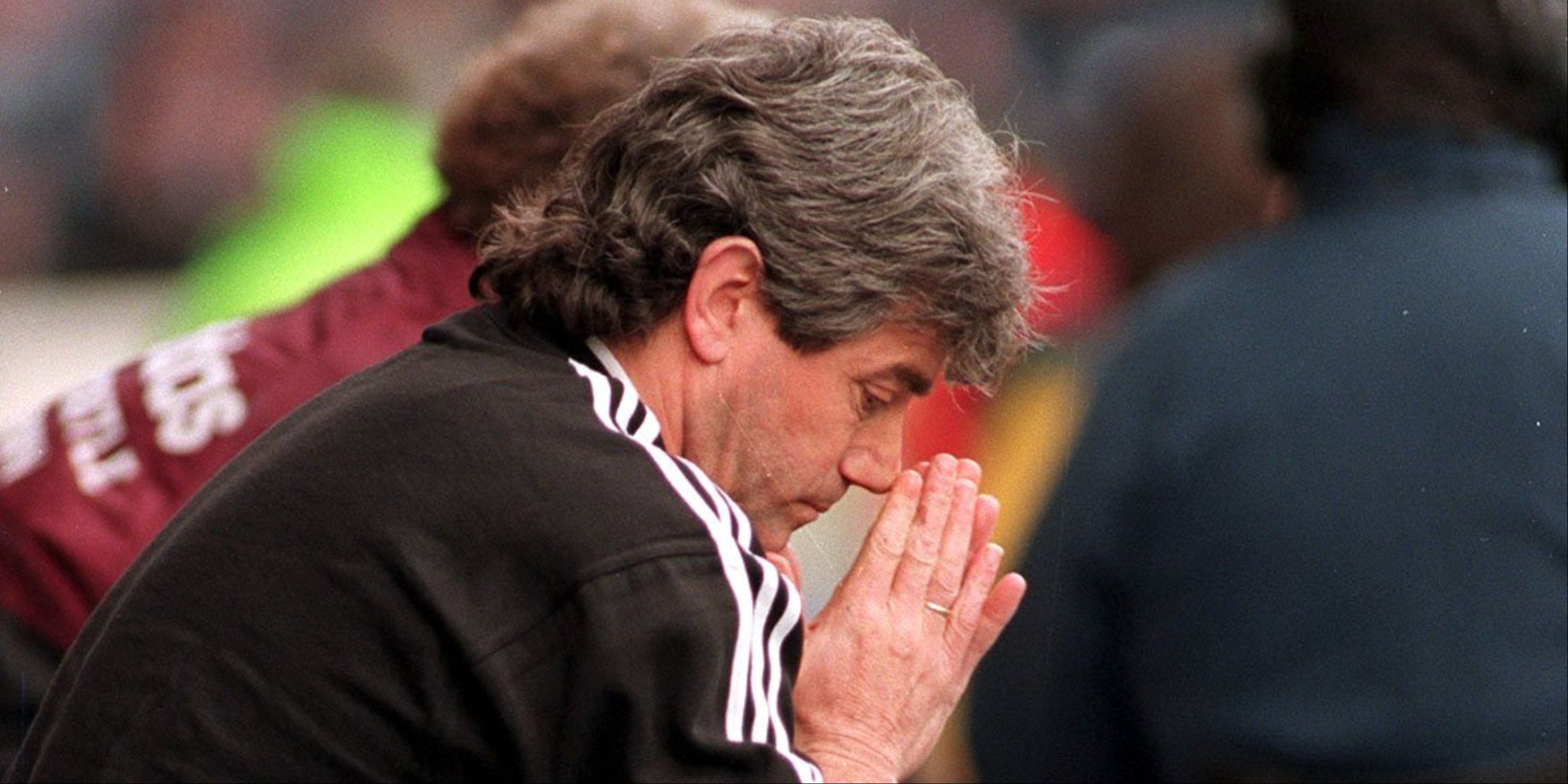 Newcastle United manager Kevin Keegan looks down in despair.