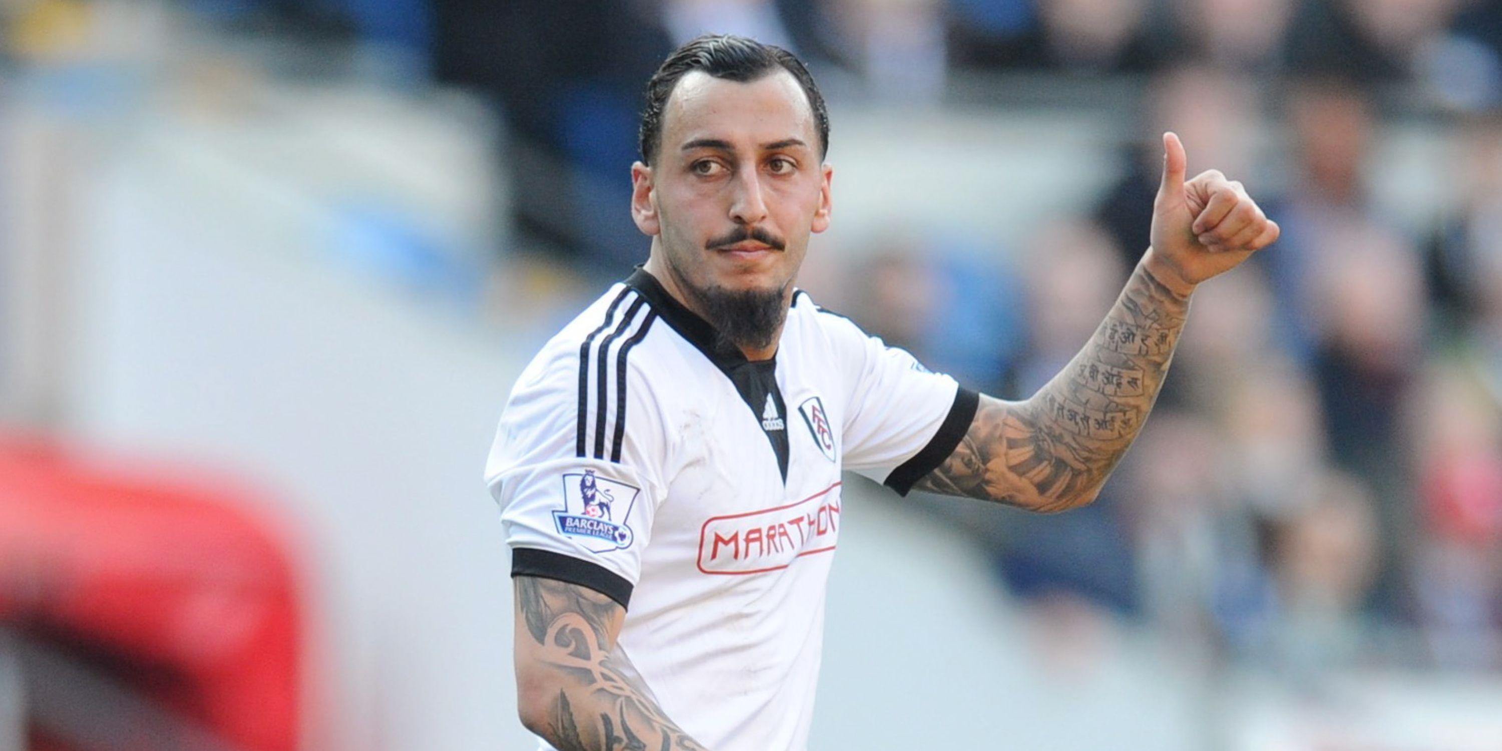 Fulham's Kostas Mitroglu giving a thumbs up
