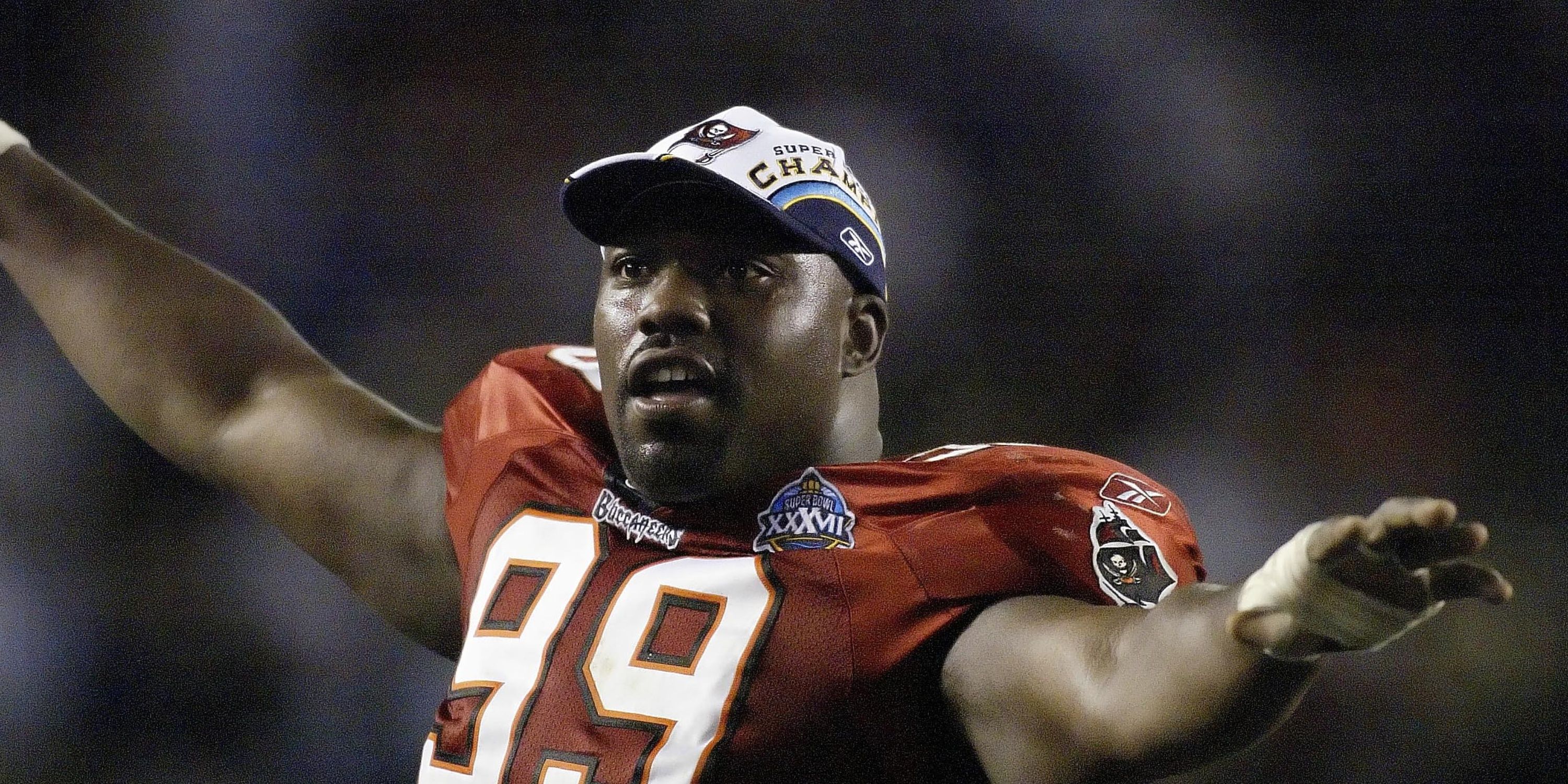Warren Sapp celebrates after winning the Super Bowl 