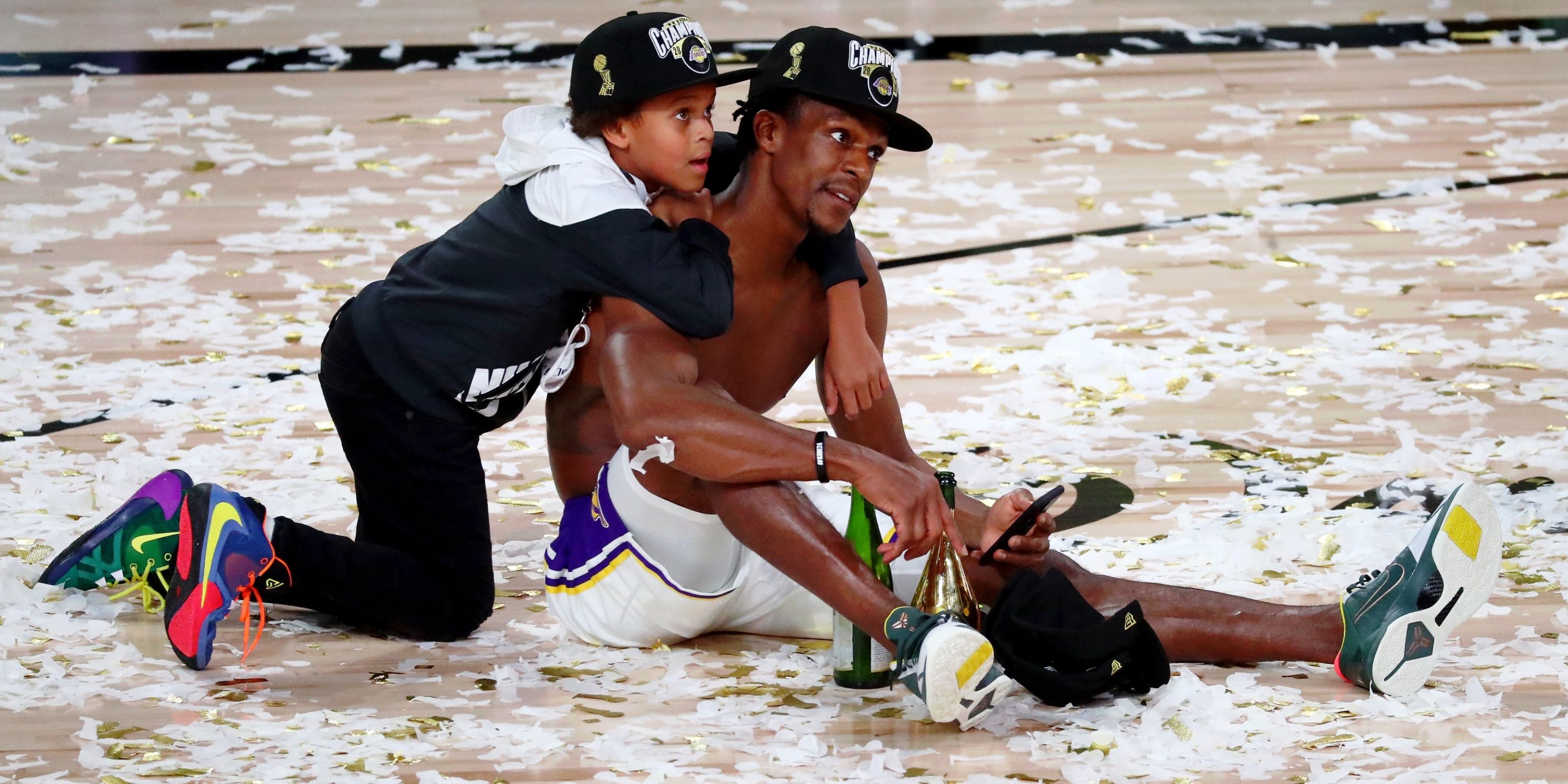 Rajon Rondo with son after Los Angeles Lakers win 2020 NBA Championship